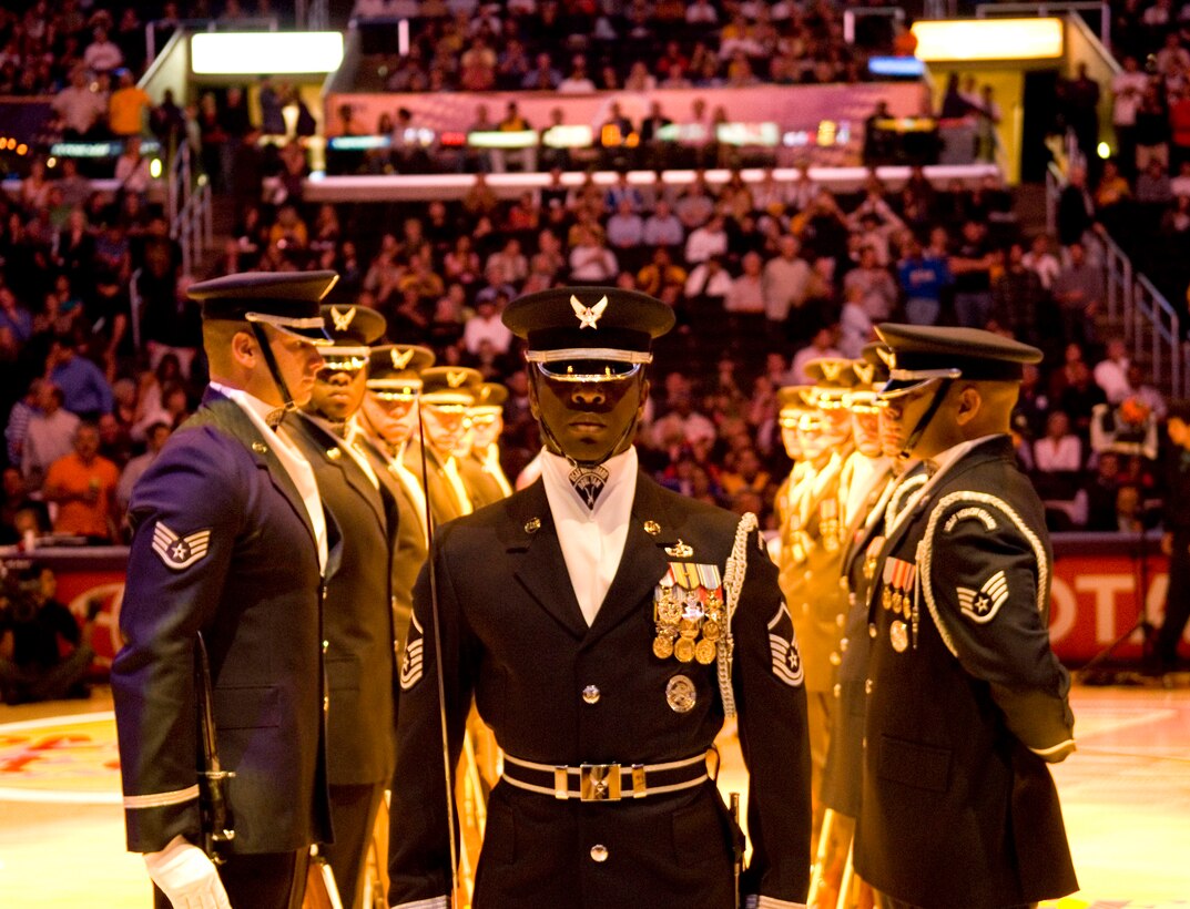 The Air Force Honor Guard drill team performs during a nationally telecast Chicago Bulls and Los Angeles Lakers basketball game in front of nearly 20,000 fans Nov. 18 at the Staples Center in Los Angeles. (U.S. Air Force photo/Staff Sgt. Raymond Hoy) 