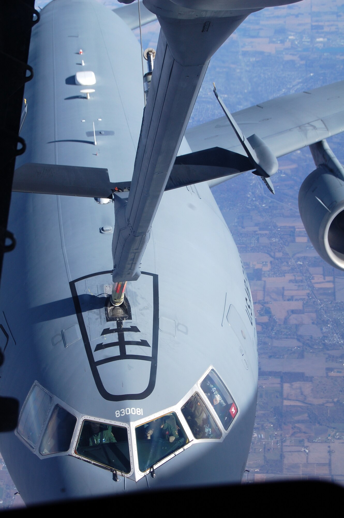 A KC-10 Extender from McGuire Air Force Base, N.J., is refueled by another KC-10 from McGuire Nov. 6, 2008, over the central United States.  The KC-10 is one of the aircraft stationed at McGuire that helps the Air Force "fly, flight and win ... in air, space and cyberspace." (U.S. Air Force Photo/Tech. Sgt. Scott T. Sturkol)