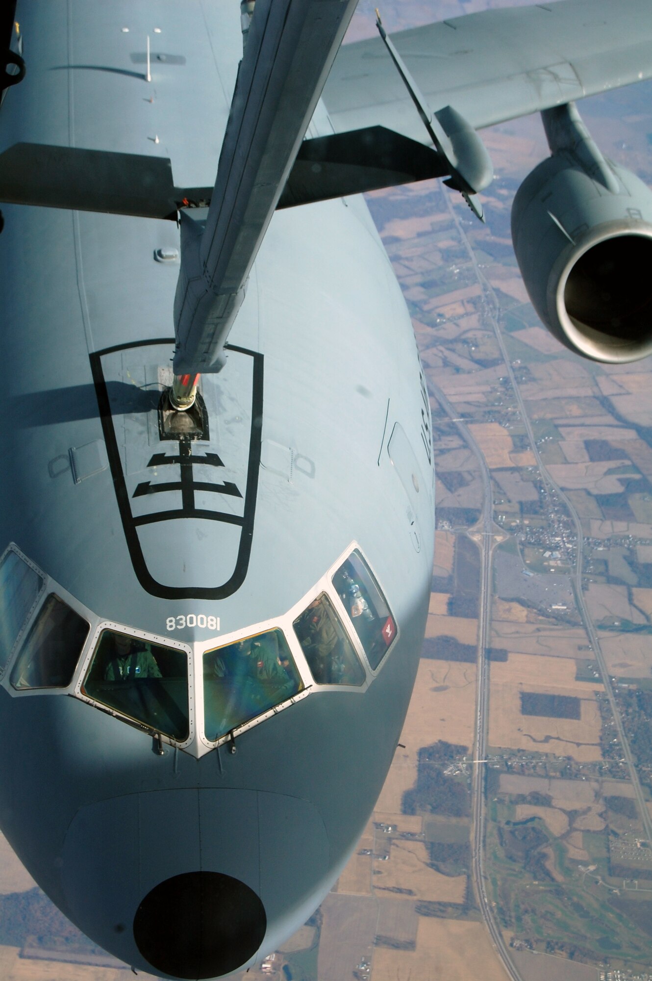 A KC-10 Extender from McGuire Air Force Base, N.J., is refueled by another KC-10 from McGuire Nov. 6, 2008, over the central United States.  The KC-10 is one of the aircraft stationed at McGuire that helps the Air Force "fly, flight and win ... in air, space and cyberspace." (U.S. Air Force Photo/Tech. Sgt. Scott T. Sturkol)