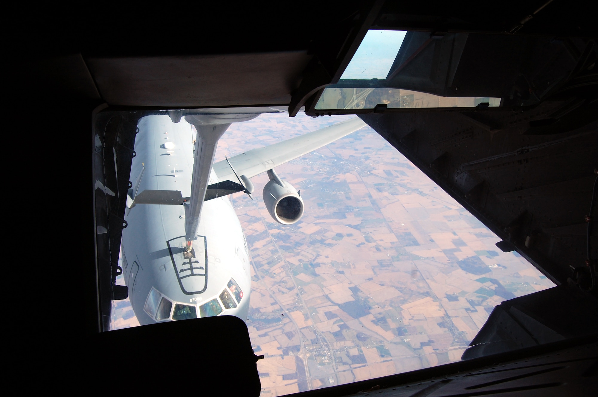 A KC-10 Extender from McGuire Air Force Base, N.J., is refueled by another KC-10 from McGuire Nov. 6, 2008, over the central United States.  The KC-10 is one of the aircraft stationed at McGuire that helps the Air Force "fly, flight and win ... in air, space and cyberspace." (U.S. Air Force Photo/Tech. Sgt. Scott T. Sturkol)