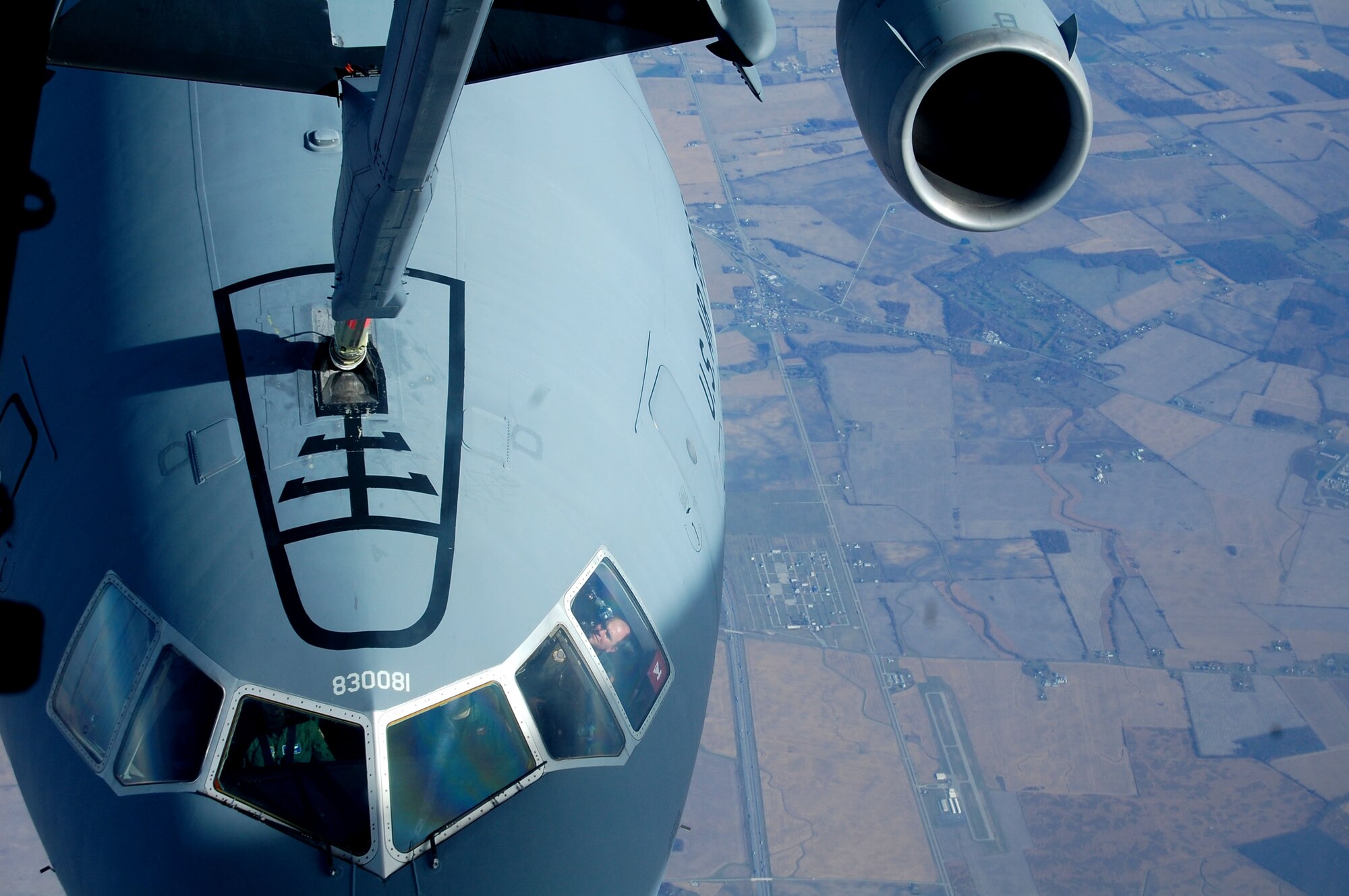 A KC-10 Extender from McGuire Air Force Base, N.J., is refueled by another KC-10 from McGuire Nov. 6, 2008, over the central United States.  The KC-10 is one of the aircraft stationed at McGuire that helps the Air Force "fly, flight and win ... in air, space and cyberspace." (U.S. Air Force Photo/Tech. Sgt. Scott T. Sturkol)