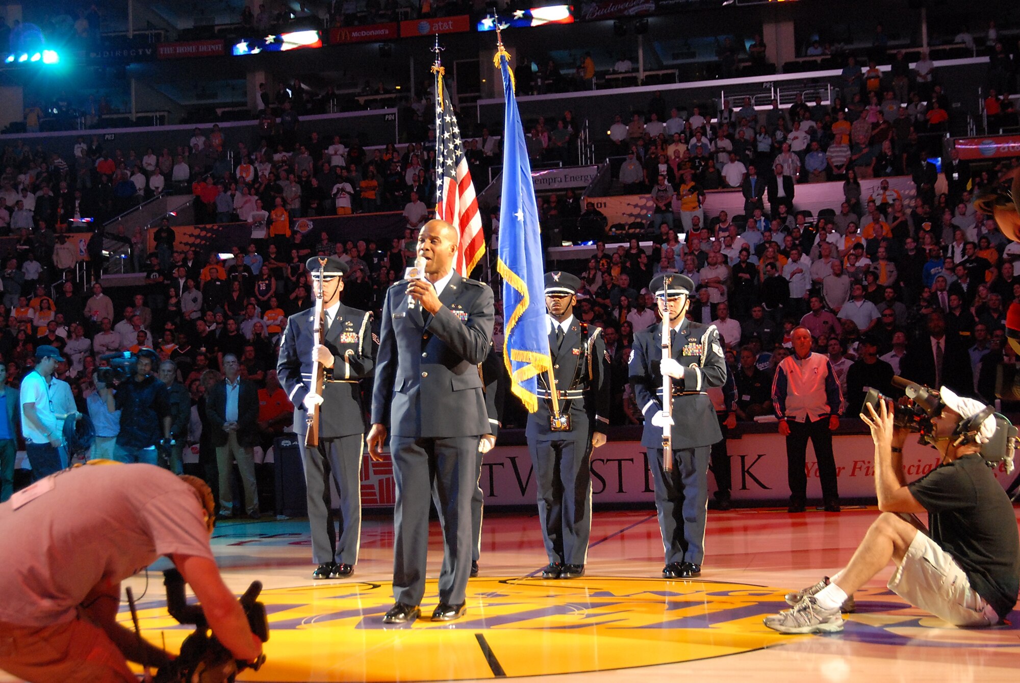 Space and Missile Systems Center’s Lt. Col. Ivan Thompson sang the National Anthem at the Staples Center prior to the start of the Lakers vs. Bulls game, Nov. 18. (Photo by Joe Juarez)