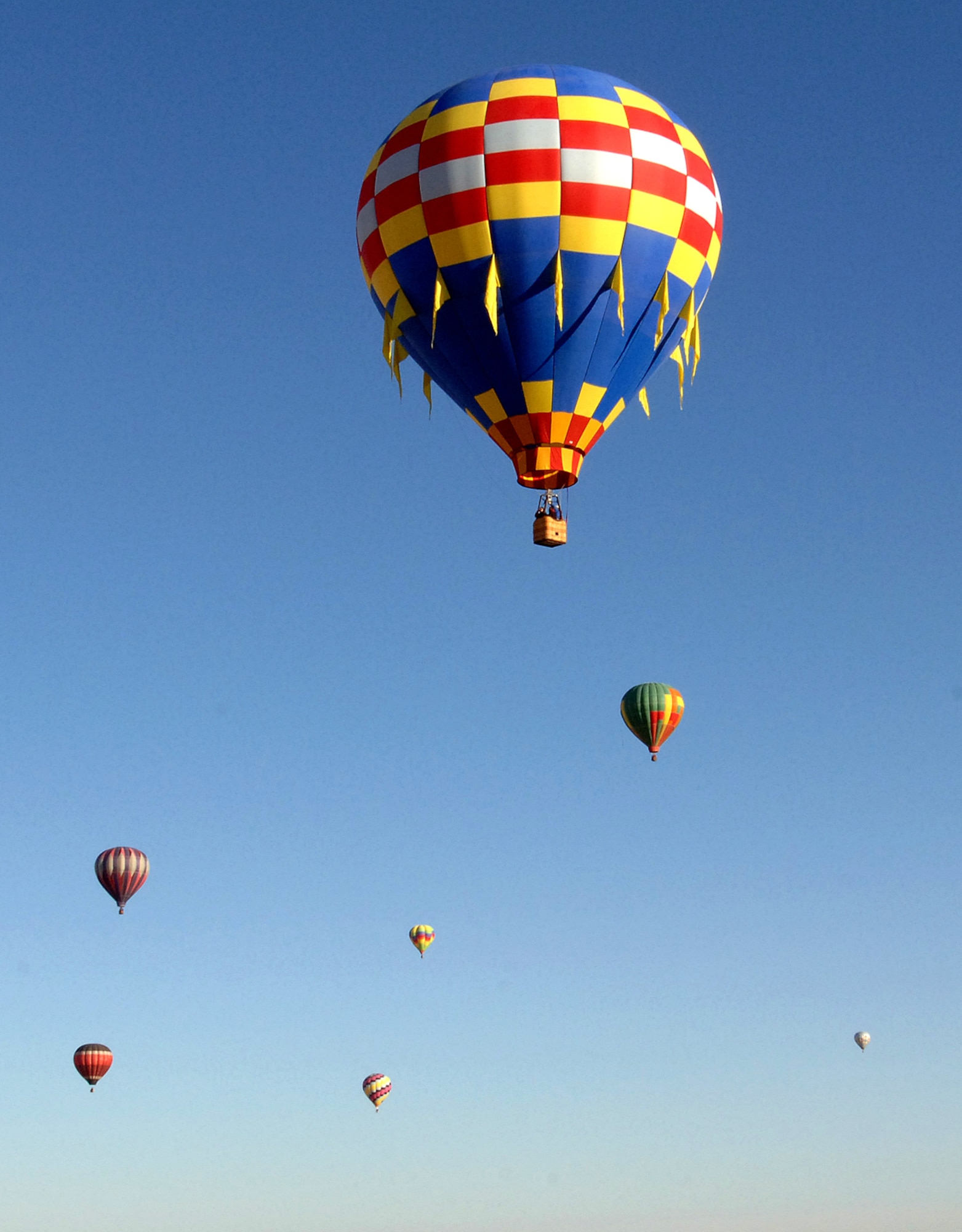 Members of Team Holloman and the local community set up their Hot Air Balloons at Holloman Air Force Base, N.M., Nov. 15. Several people from Holloman and the local area came out for the Holloman Balloon Fest.  (U.S. Air Force photo/Airman 1st Class Michael Means)