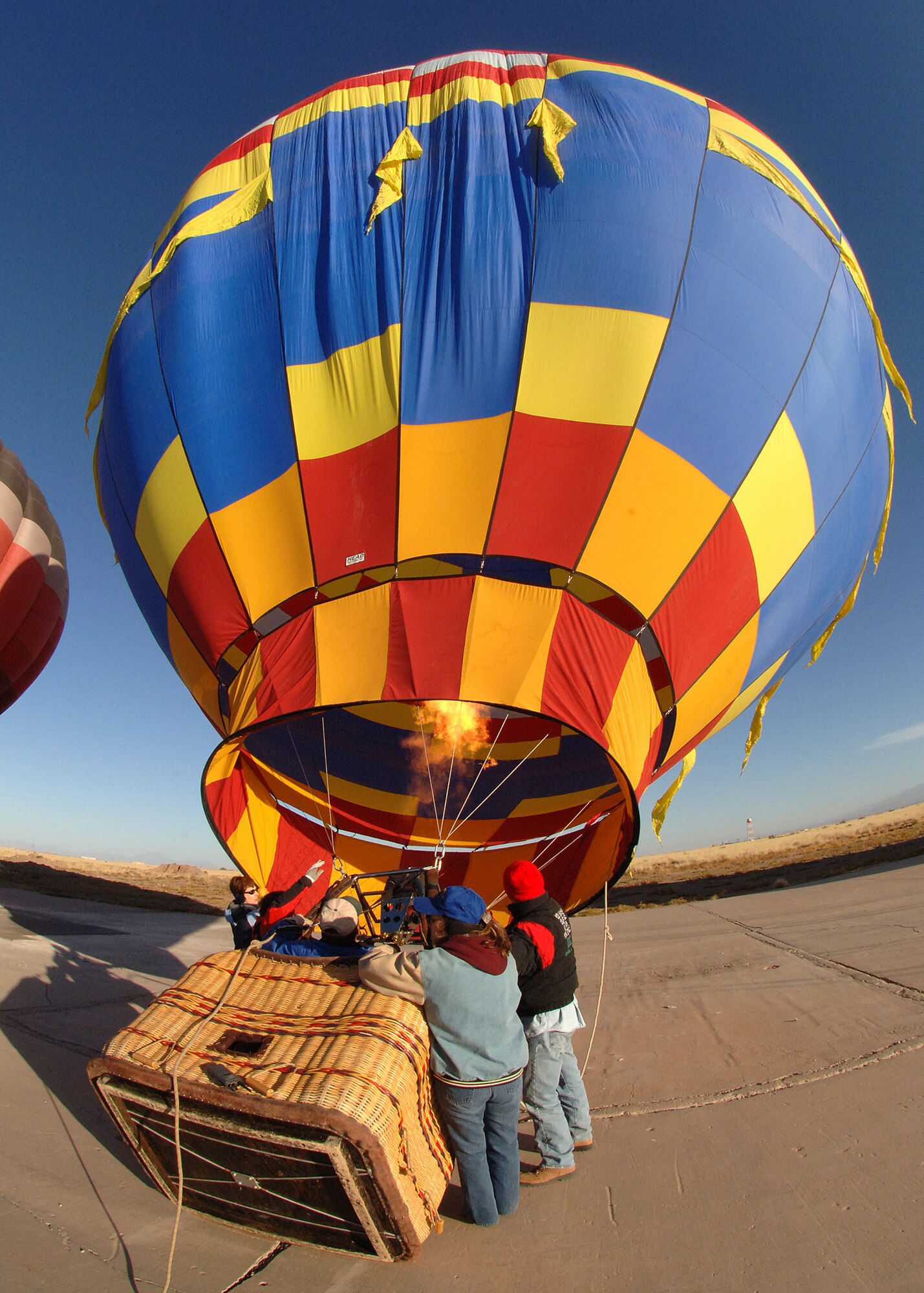 Members of Team Holloman and the local community set up their Hot Air Balloons at Holloman Air Force Base, N.M., Nov. 15. Several people from Holloman and the local area came out for the Holloman Balloon Fest.  (U.S. Air Force photo/Airman 1st Class Michael Means)