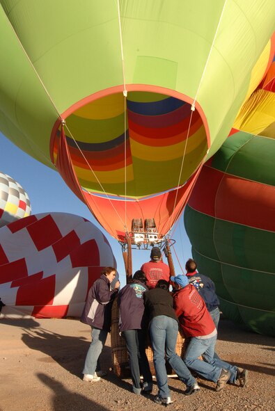 Members of Team Holloman and the local community set up their Hot Air Balloons at Holloman Air Force Base, N.M., Nov. 15. Several people from Holloman and the local area came out for the Holloman Balloon Fest.  (U.S. Air Force photo/Airman 1st Class Michael Means)