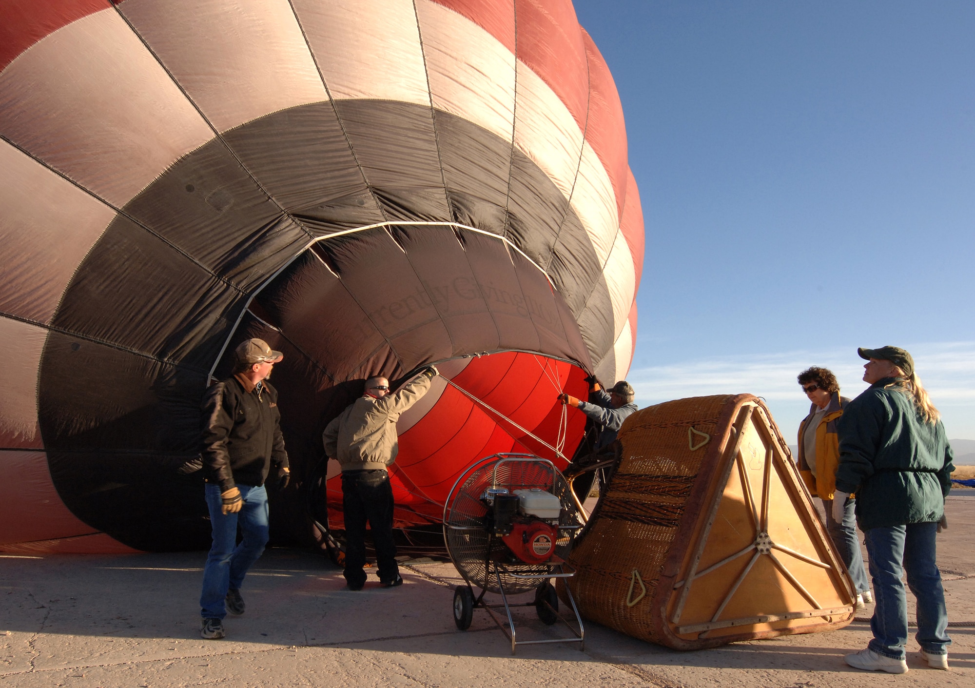 Members of Team Holloman and the local community set up their Hot Air Balloons at Holloman Air Force Base, N.M., Nov. 15. Several people from Holloman and the local area came out for the Holloman Balloon Fest.  (U.S. Air Force photo/Airman 1st Class Michael Means)