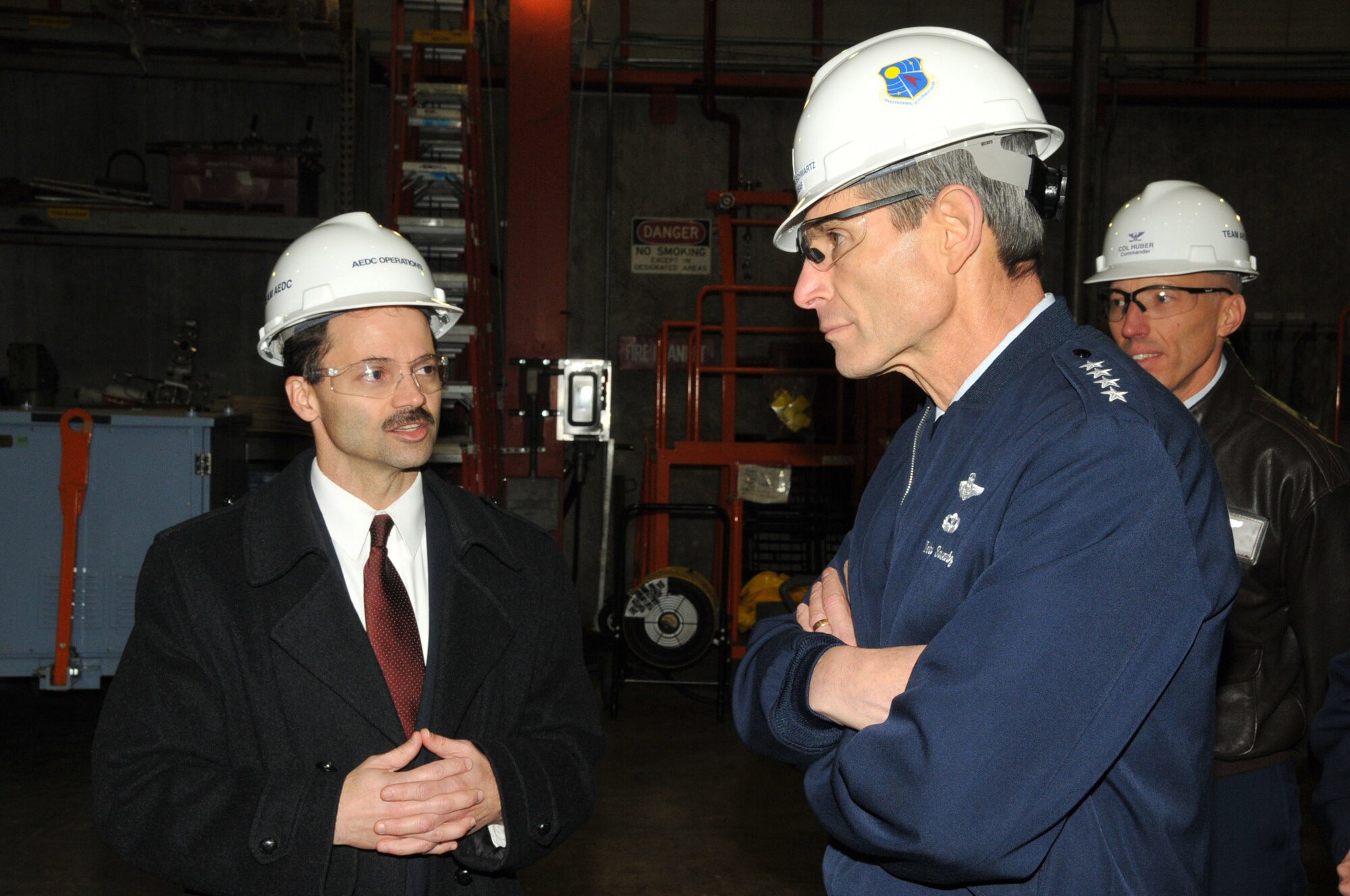 Ed Tucker explains to Chief of Staff of the Air Force Gen. Norton Schwartz the Arnold Engineering Development Center role in helping to certify the Air Force fleet to operate on a 50/50 blend of JP-8 and synthetic fuel by 2011 Nov. 17 at Arnold Air Force Base, Tenn. Mr. Tucker is the deputy director of the 717th Test Squadron. (U.S. Air Force photo/David Housch)
