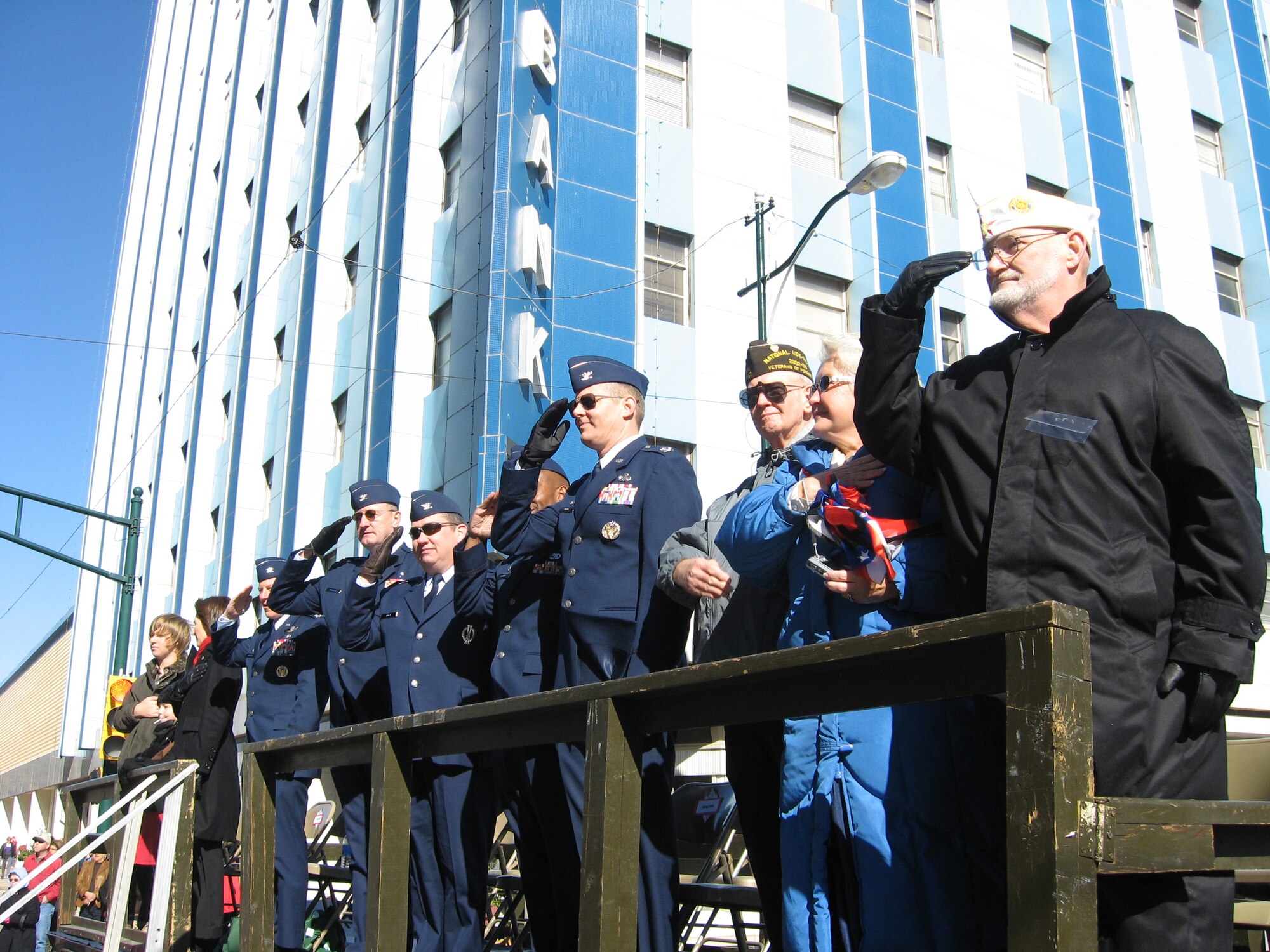 Sheppard officials render a salute Nov. 15 during the North Texas Veterans Council Veterans' Day Parade in downtown Wichita Falls. Leadership from the base is invited to participate on the review stand at the annual event. (U.S. Air Force photo/Debi Smith)