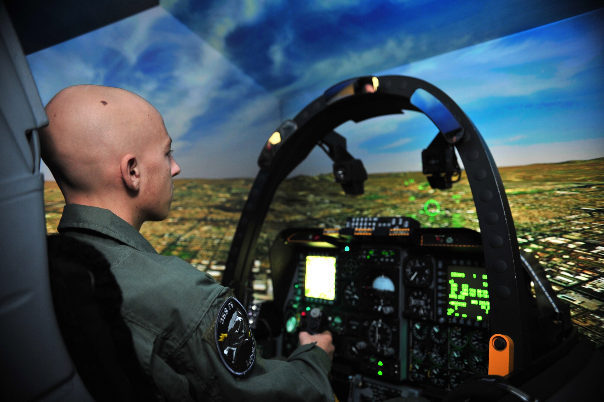 Pilot For A Day James Nasby, 17 years old, flies an A-10 simulator during his visit to D-M, November 14. The Pilot For A Day program is designed to help children with disabilities or serious illnesses enjoy a day focused on them and their interest in aviation. Activities in the program include: visiting the base fire department, using Night Vision goggles, flying an A-10 simulator, and seeing an A-10 up close. (U.S. Air Force photo/Senior Airman Noah R. Johnson)