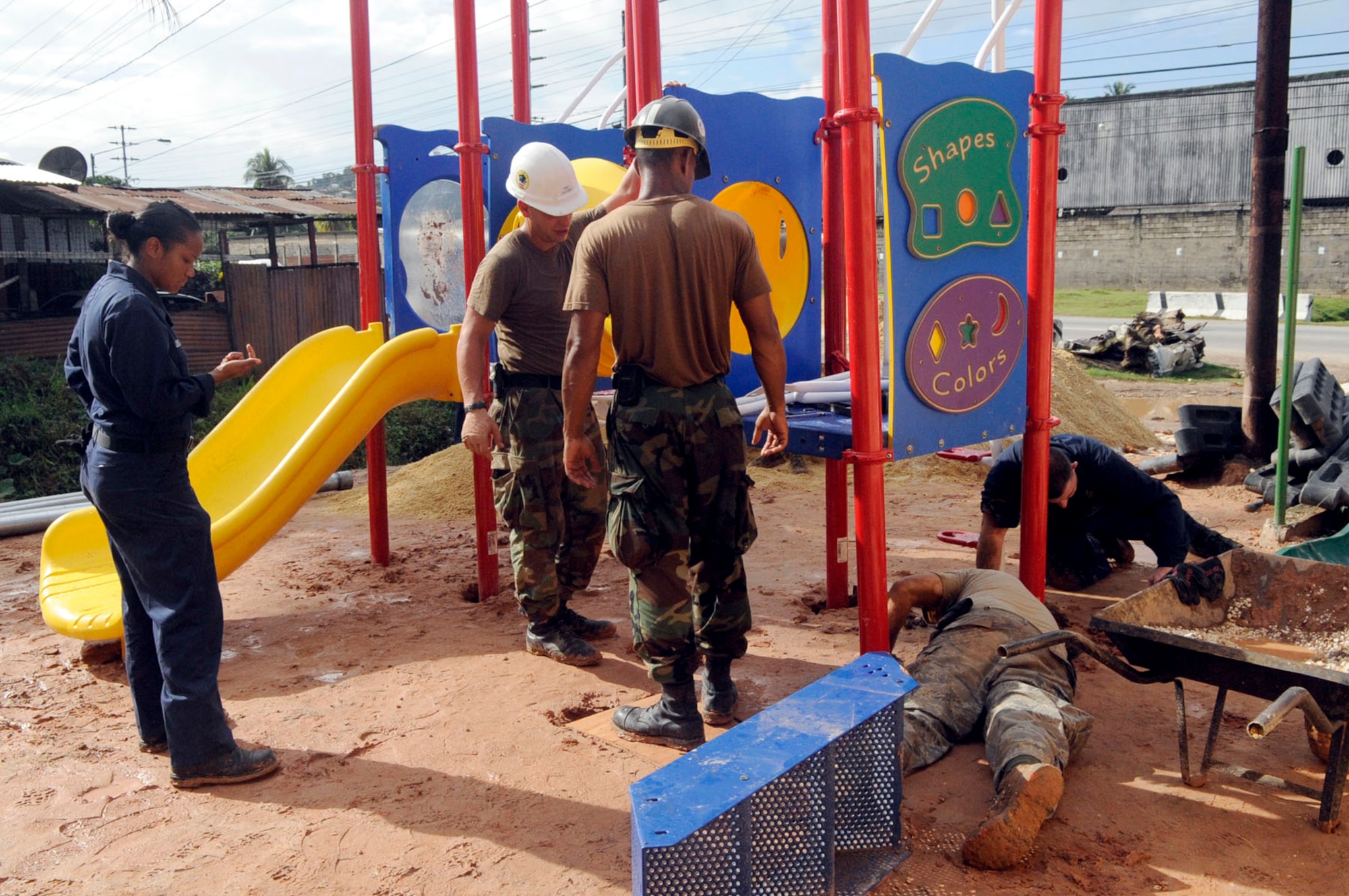 Trinidad and Tobago--US Airmen and Seamen construct a playground from the ground up for the All-in-One Development Centre in the most dangerous neighborhood of Port-of-Spain while supporting Operation Continuing Promise 2008.  Along with the playground, they have provided a shed, fencing, and electrical maintenance in the amount of 20K raw materials to help a local school.   (US Air Force photo/Master Sgt. Cecilio Ricardo) (released)