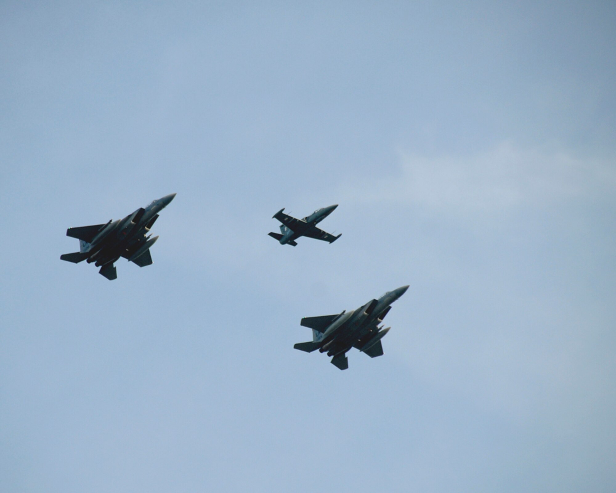 Two F-15 Eagles soar with a Lithuanian Air Force L-39 Albatross Nov. 11 over Siauliai, Lithuania during an exercise intercept. The F-15’s will be here, supporting the NATO Baltic Air Policing mission, through the new year.