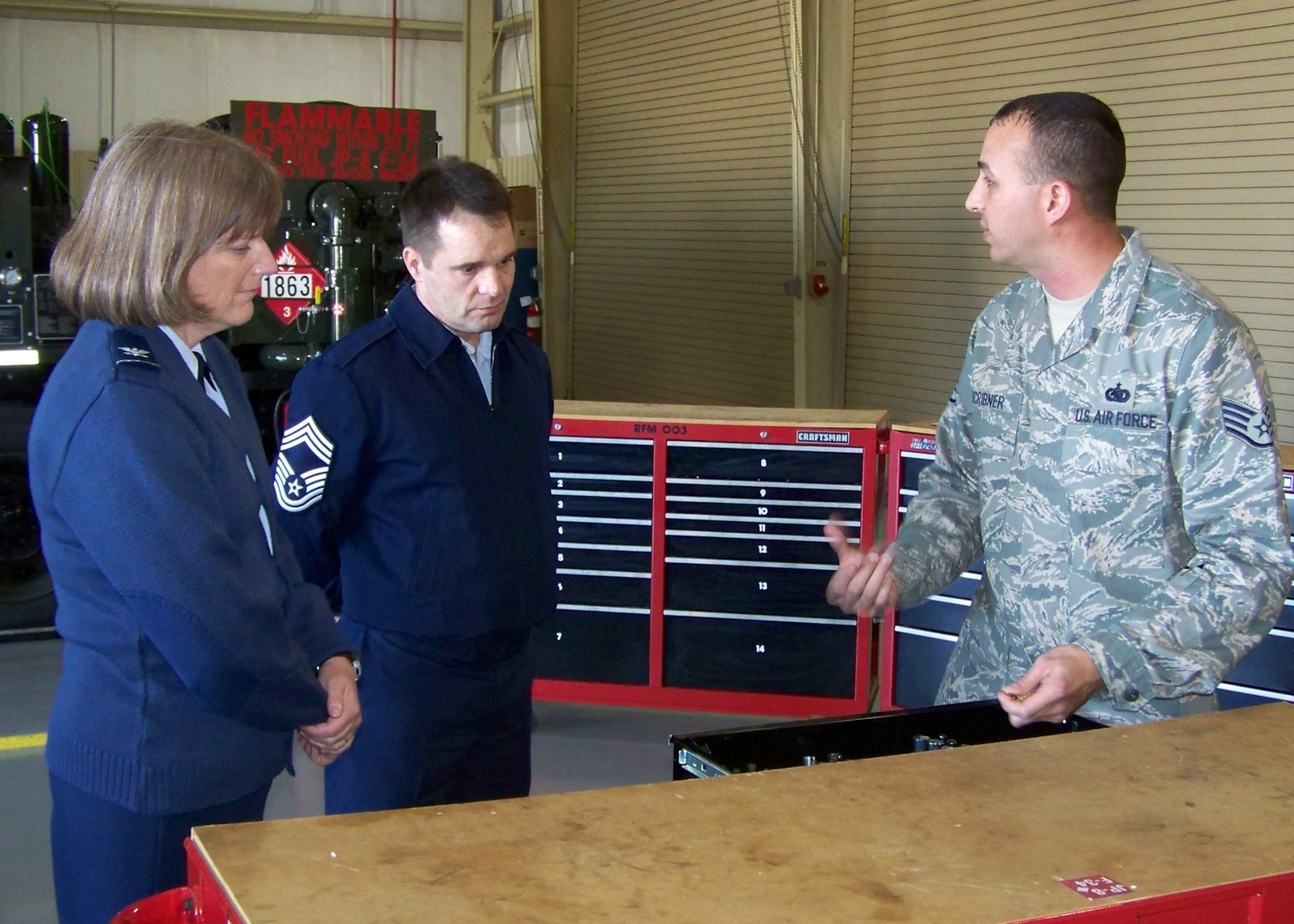 Staff Sgt. Raymond Scribner briefs Col. Catherine DeVera and Chief Master Sgt. Russell Steger on refueling maintenance operations during their visit to Charleston AFB Nov. 17. The 437th Logistics Readiness Squadron?s Fuels Management Flight geared up Nov. 16-18 for an opportunity to showcase their team?s excellence as one of three finalists to compete for the William N. Penton Trophy and the title of best fuels operation in Air Mobility Command. Sergeant Scribner is with the 437 LRS and Colonel DeVera and Chief Steger are with the AMC Penton Award Selection Team. (Courtesy photo)