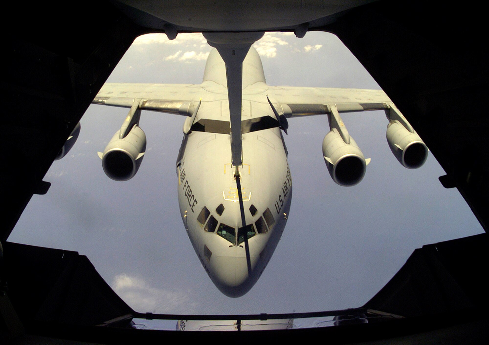 A C-17 Globemaster III is refueled in flight. (U.S. Air Force courtesy photo)