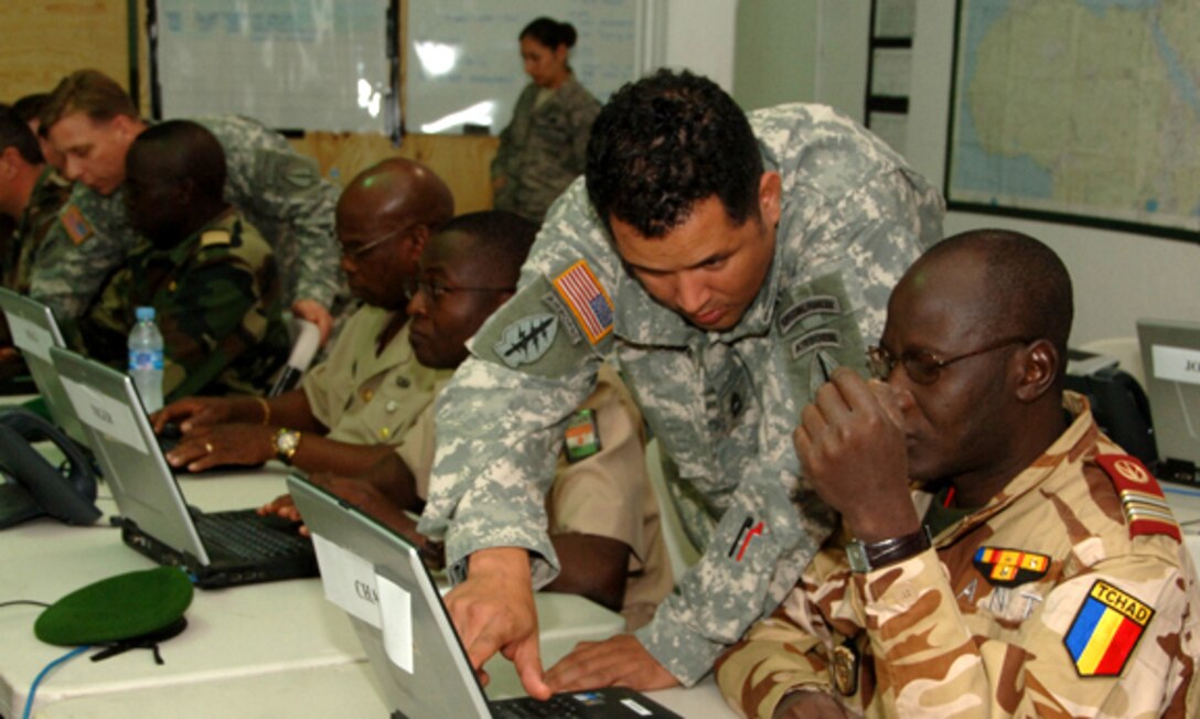 Various armed forces servicemembers from Europe, Africa and the United States participate in training group activities during Operation Flintlock, a biannual exercise designed to foster regional relationships and promote partner-nation to advance regional security and stability, on Naval Station Rota, Spain on Nov. 7, 2008.