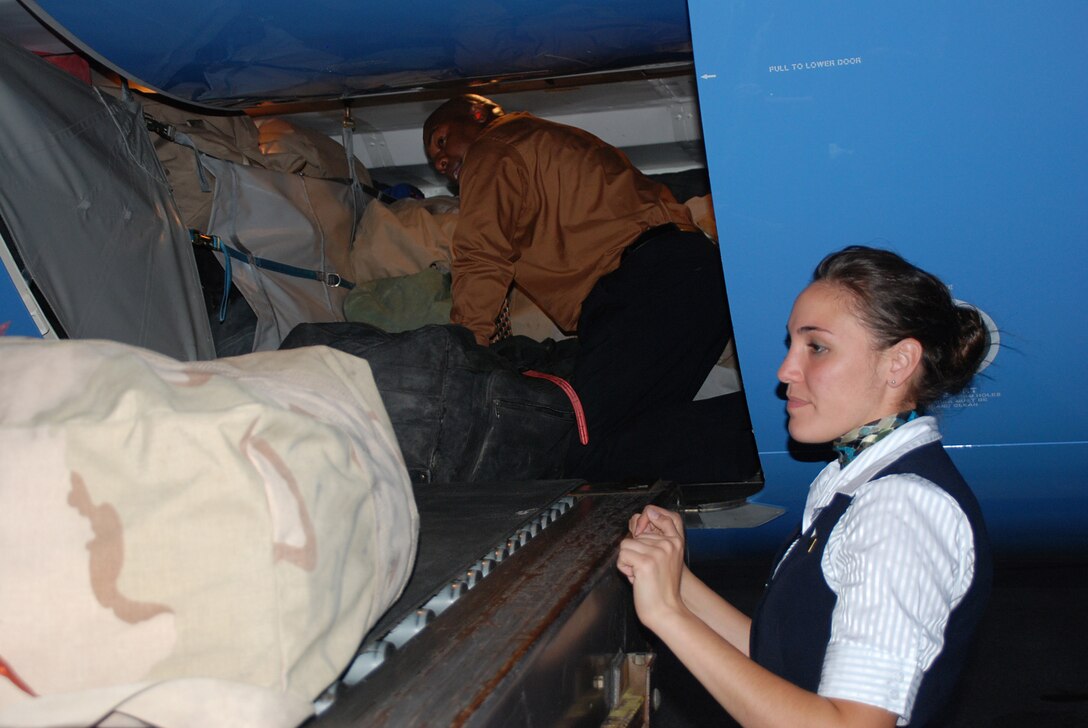 Deployers returned recently on one of the wing?s C-40C aircraft, complete with flight
attendants Staff Sgt. Oriel Rodriquez and MSgt. Ken Posey, who not only loaded all the baggage, but also served the delicious meals to 932nd Airmen who were grateful.  (U.S. Air Force by Tech. Sgt. Dan Oliver)
