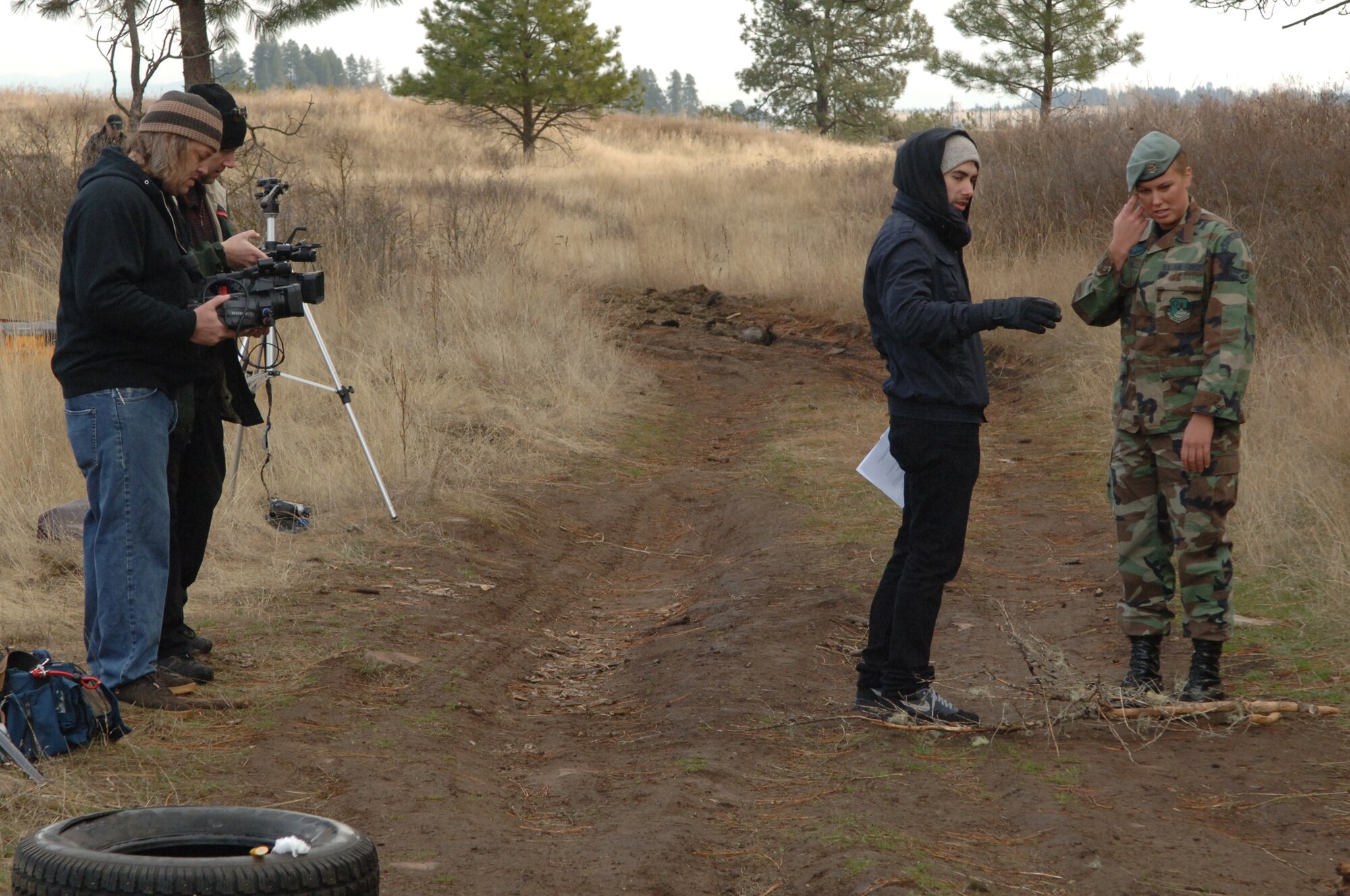 FAIRCHILD AIR FORCE BASE, Wash. – Airman 1st Class Tiffany Zaloudek, 22nd Training Squadron Survival, Evasion, Resistance and Escape Specialist, receives instruction from Rich Browd, MTV “How To Show” director during the filming process here Nov. 17. The episode starring Airman Zaloudek will demonstrate how to survive when you find yourself stranded and in need of being rescued. (U.S. Air Force photo / Senior Airman Jocelyn A. Ford)