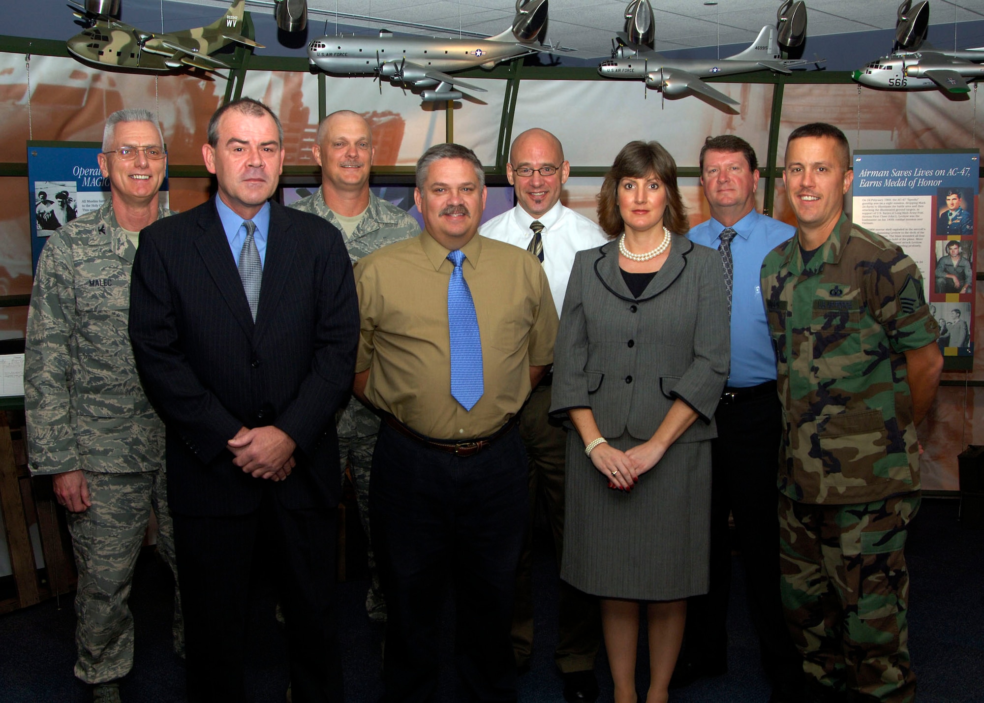 The Air Traffic Control Association on Nov. 4 presented Air Mobility Command?s Terminal Instrument Procedures team with the Earl F. Ward Memorial Award at its 53rd annual conference and exposition in Washington, D.C.  The AMC team is composed of 13 air traffic control TERP specialists, located both at Scott Air Force Base, Ill., and at MacDill AFB, Fla. The Scott AFB TERP specialists are: (back row, left to right) Col. William Malec, Tech. Sgt. Richard Johnston, Scott Haller and John Vanwinkle; (front row, left to right) Matthew Rush, John Figgins, Kim Outman, and Master Sgt. Norman Dunson.