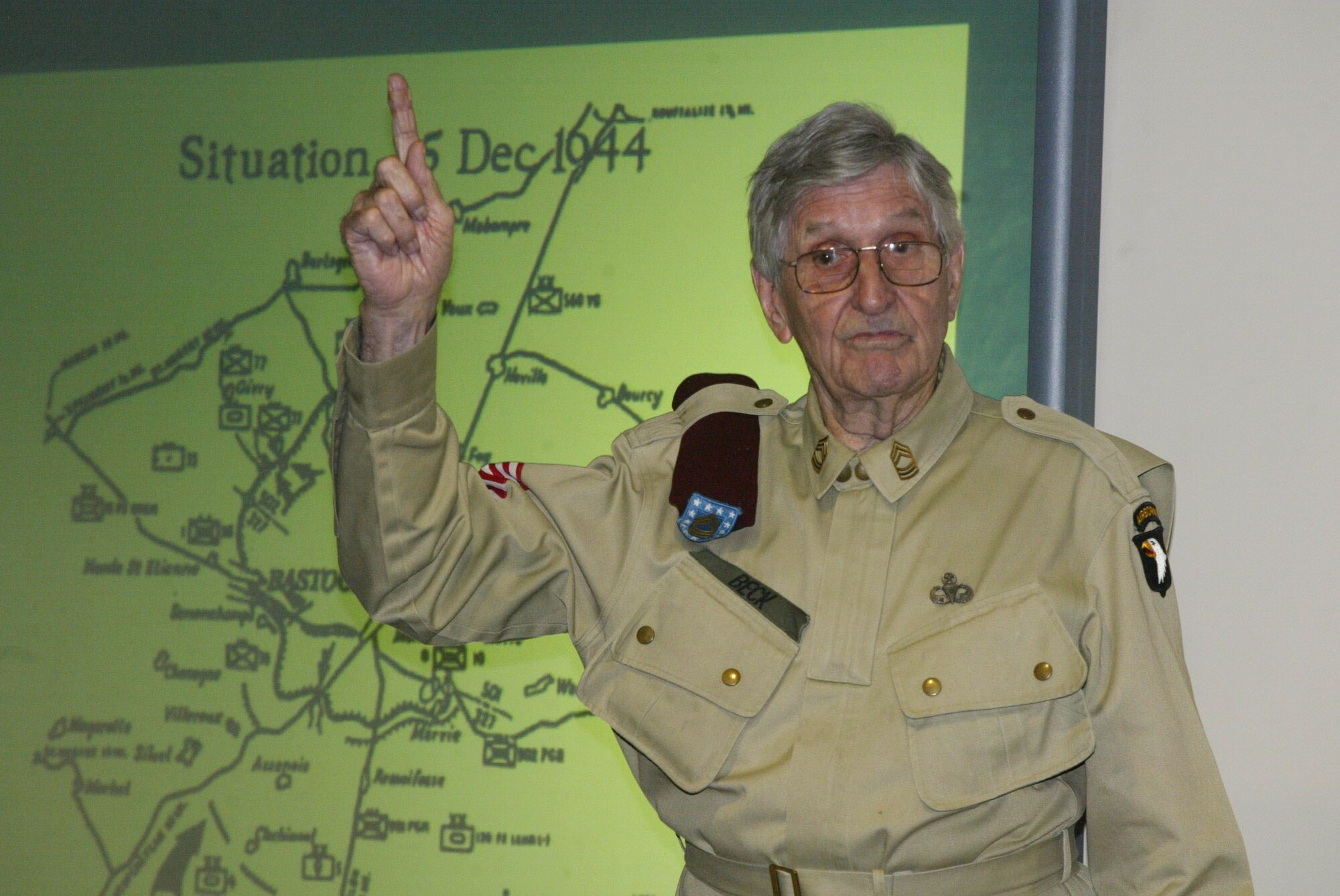 Retired Master Sgt. Carl Beck gives a vivid account of his experiences during World War II at the 700th Airlift Squadron’s November 2008 Air Warrior briefing. (Air Force photo/Don Peek)