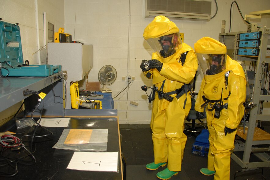 U.S. Air Force,  Maryland Air National Guard, MSgt Matthew Crabill of the Readiness/ Emergency Management Team takes photo of white power and suspicious package during the Terrorist Use of WMD (Biological) EXERCISE. The 175th Wing Emergency & First Responders (EXERCISE) to include FIRE, SFS, BIO and CEX on August 22, 2008.  (U.S. Air Force Photo by MSgt Jim Foard) (RELEASED), Official Photo by SMSgt Jim Foard, 175th Public Affairs, Warfield Air National Guard Base, Maryland, UNITED STATES 7.
