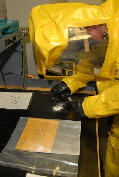 U.S. Air Force,  Maryland Air National Guard , MSgt Matthew Crabill (Readiness/Emergency  Management Team) takes a sample of white power from a suspicious package during a 175th Wing  Terrorist use of WMD ( Biological) EXERCISE, Emergency & First Responders base (EXERCISE) to include Fire, SFS, BIO,and CEX,  on August 22, 2008,   (U.S. Air Force Photo by SMSgt Jim Foard) (RELEASED), Official Photo by SMSgt Jim Foard, 175th Public Affairs, Warfield Air National Guard Base, Maryland, UNITED STATES 7.