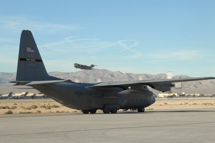 A C-130 Hercules taxis during the Mobility Air Forces Exercise, MAFEX, Nov. 19, 2008, Nellis Air Force Base, Nev. Approximately twelve U.S. Air Force bases participate in MAFEX at the U.S. Air Force Weapons School twice a year, testing C-17 Globemasters and C-130 Hercules crews' ability to join together in formation at a specific time and location to drop a brigade-size force anywhere in the world. (U.S. Air Force photo/Staff Sgt. Taylor Worley)