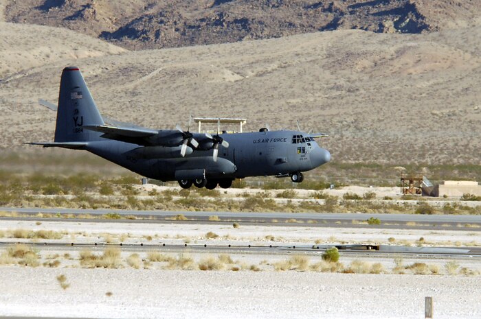 A C-130 Hercules lands during the Mobility Air Forces Exercise, MAFEX, Nov. 19, 2008, Nellis Air Force Base, Nev. Approximately twelve U.S. Air Force bases participate in MAFEX at the U.S. Air Force Weapons School twice a year, testing C-17 Globemasters and C-130 Hercules crews' ability to join together in formation at a specific time and location to drop a brigade-size force anywhere in the world.  (U.S. Air Force photo / Senior Airman Jason R. Huddleston)

