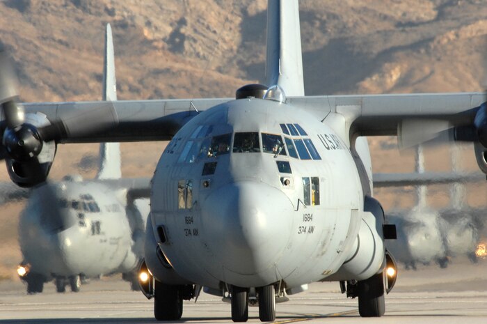 Cargo aircraft taxi during the Mobility Air Forces Exercise, MAFEX, Nov. 19, 2008, Nellis Air Force Base, Nev. Approximately twelve U.S. Air Force bases participate in MAFEX at the U.S. Air Force Weapons School twice a year, testing C-17 Globemasters and C-130 Hercules crews' ability to join together in formation at a specific time and location to drop a brigade-size force anywhere in the world.  (U.S. Air Force photo by Airman 1st Class Brett Clashman)

