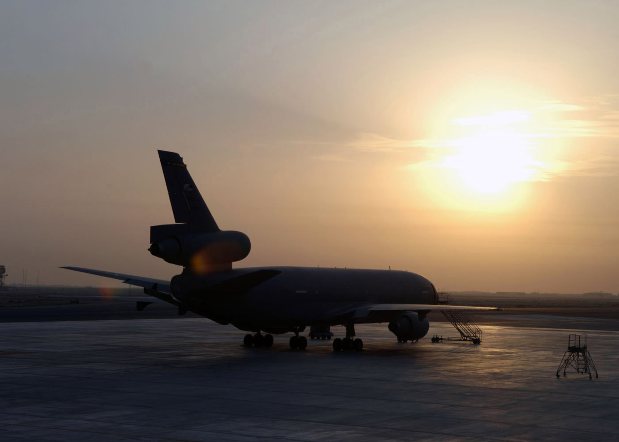 A KC-10 Extender from the 908th Expeditionary Air Refueling Squadron parks after a refueling mission. Air Force and coalition aerial refueling crews flew 41 sorties and off-loaded approximately 2.6 million pounds of fuel to 237 receiving aircraft. (U.S. Air Force photo/Airman 1st Class Matt Cook)