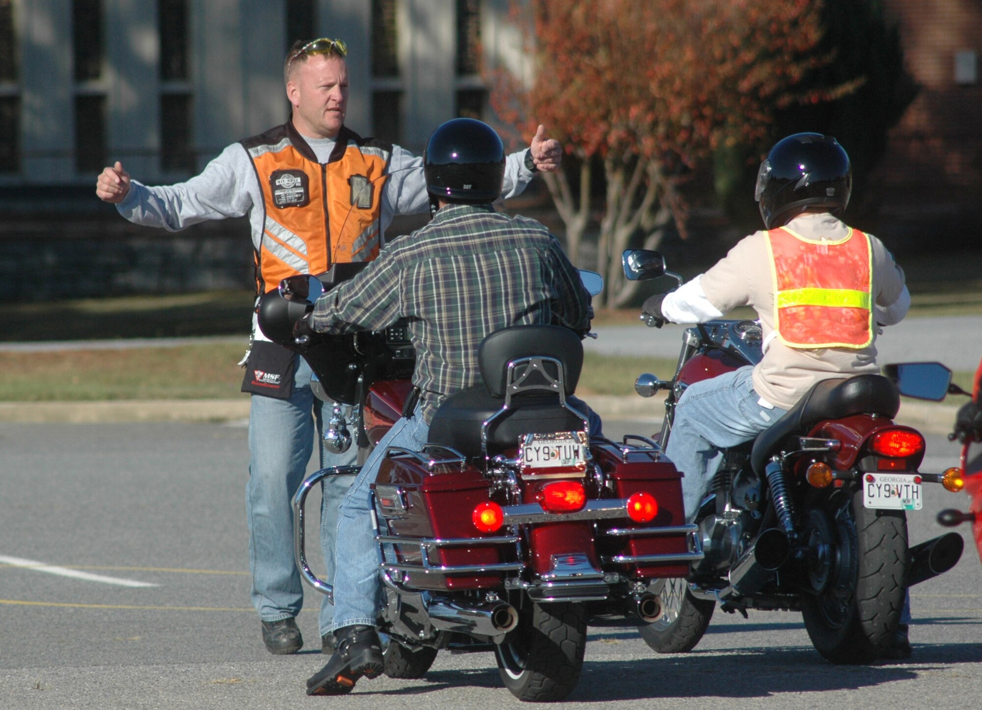 Rider instructor Scott Main gives instructions for the riders to come to a safe stop. U. S. Air Force photo by Sue Sapp