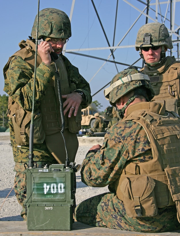 Navy Chief Warrant Officer 2 Dale Wagner, naval gunfire liaison officer with Battalion Landing Team, 3rd Battalion 2nd Marine Regiment, 22nd Marine Expeditionary Unit, coordinates a fire mission with USS Anzio, a Ticonderoga Class Guided Missile Cruiser with the Bataan Strike Group, during a Fire Support Coordination Exercise aboard Camp Lejeune, N.C., Nov. 20, 2008. The FSCEX took place in order to give the Marines the training they need to effectively call in artillery, naval gunfire, mortars or air support. The 22nd MEU is scheduled for a deployment next spring.  (Official Marine Corps photo by Cpl. Theodore W. Ritchie)