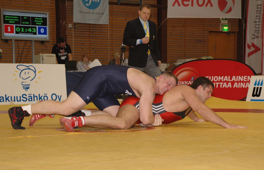 Sgt. David Arendt Jr., All Marine Wrestler at 265-pounds and Port Washington, Wis., native, grapples with his opponent, a Russian wrestler, during his second match at the Vantaa Cup Wrestling Tournament Nov. 22-23 in Vantaa, Finland. Arendt, who has been wrestling for the Marine team for over a year, ended up finishing fifth at the tournament which featured world-call Greco-Roman wrestlers from more than nine countries.