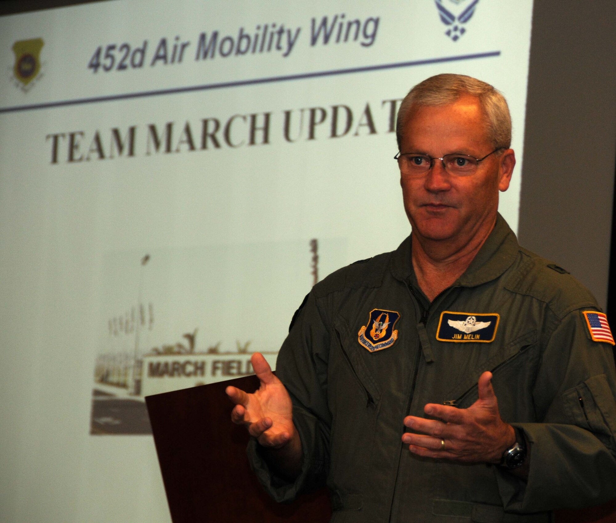 Brig. Gen. Jim Melin, 452nd Air Mobility Wing commander, welcomes and briefs entertainment industry professionals before an air refeuling mission as part of Air Force Week. (U.S. Air Force photo by Lt. Col. Francisco Hamm)