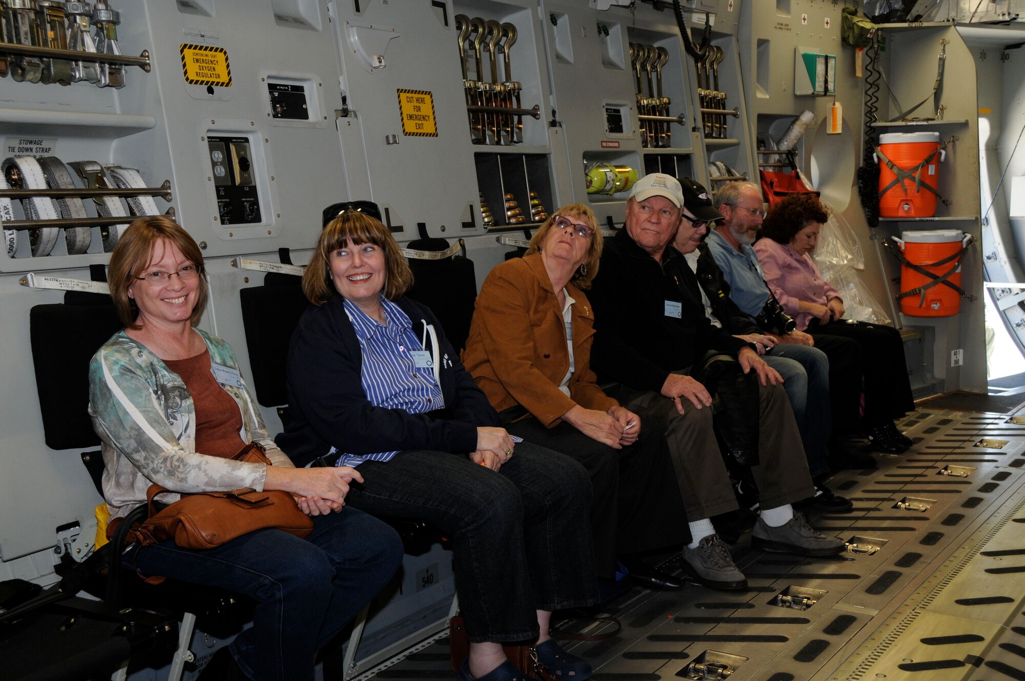 Members of the entertainment industry get familiar with a C-17 before their flight, and
deplane after a refueling mission at March ARB as part of Air Force Week. (U.S. Air Force photo by Lt. Col. Francisco Hamm)