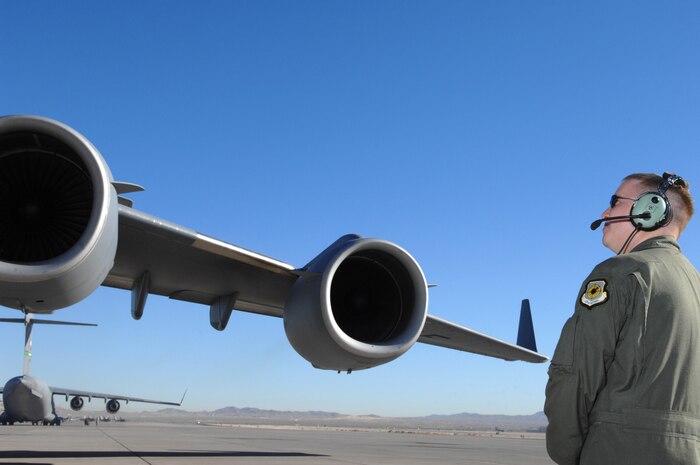 Staff Sgt. Caleb Patterson, a C-17 loadmaster assigned to the 57th Weapons School, McGuire Air Force Base, N.J., conducts a pre-flight inspection during the U.S. Air Force Weapons School's Mobility Air Forces Exercise, MAFEX, at Nellis Air Force Base, Nev., Nov. 19, 2008. Approximately twelve U.S. Air Force bases participate in MAFEX at the U.S. Air Force Weapons School twice a year, testing C-17 Globemasters and C-130 Hercules crews' ability to join together in a formation at a specific time and location to drop a brigade sized force anywhere in the world. (U.S. Air Force Photo/Senior Airman Larry E. Reid Jr., Released)