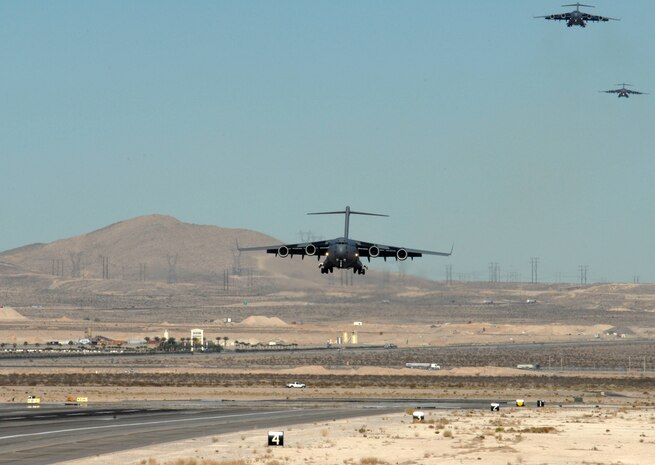 A C-17 Globemaster prepare to land during the U.S. Air Force Weapons School's Mobility Air Forces Exercise, MAFEX, at Nellis Air Force Base, Nev., Nov. 19, 2008. Approximately twelve U.S. Air Force bases participate in MAFEX at the U.S. Air Force Weapons School twice a year, testing C-17 Globemasters and C-130 Hercules crews' ability to join together in a formation at a specific time and location to drop a brigade sized force anywhere in the world. (U.S. Air Force Photo/Senior Airman Larry E. Reid Jr., Released)