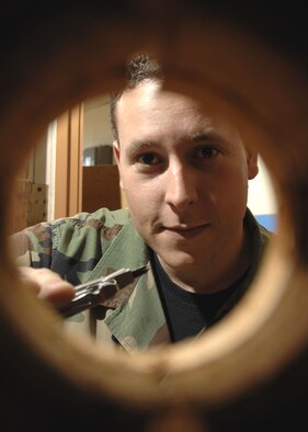 SCOTT AIR FORCE BASE, Ill. -- Staff Sgt. Norman Fabregat-LeBlanc, 375th Civil Engineer Squadron structural craftsman, is responsible  for all locks on base.

(U.S. Air Force photo/Tech. Sgt. Michelle Larche)