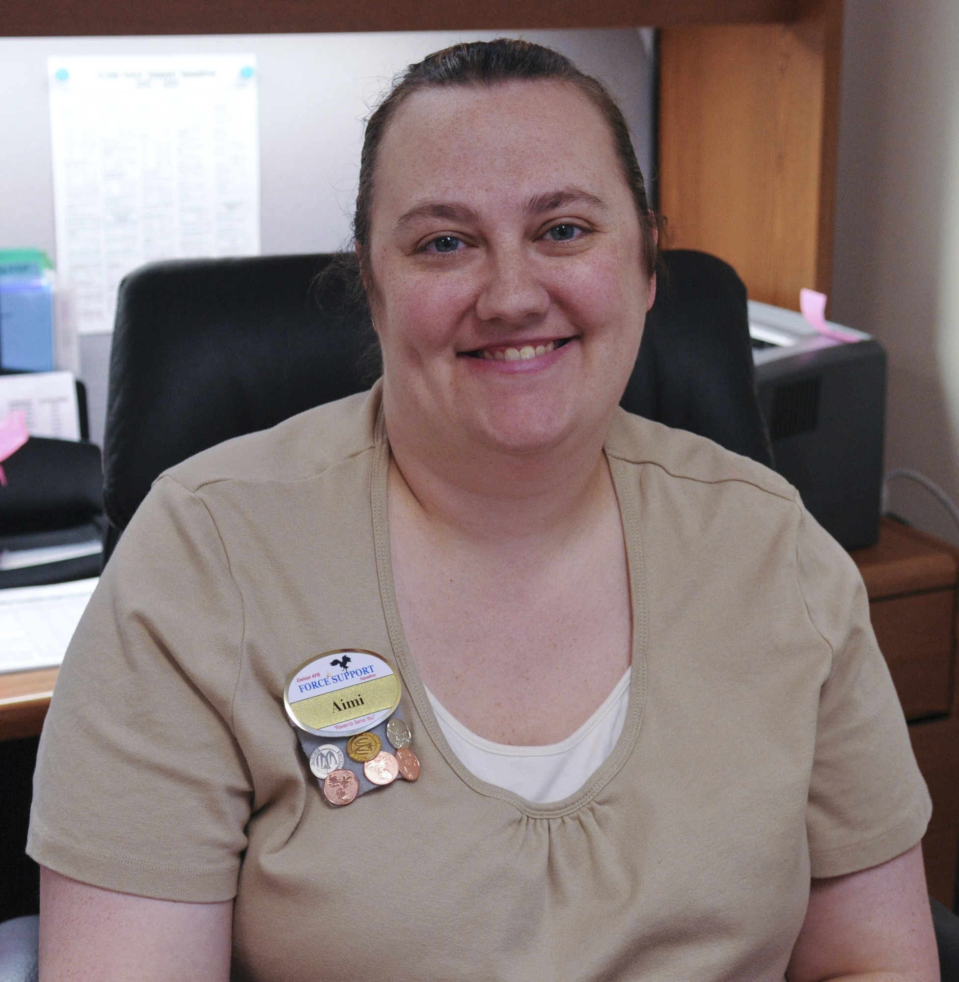 Mrs. Aimi Bohlman, 354th Force Support Squadron NAF Human Resources office, watches the Macy's Thanksgiving Day parade and enjoys spending time with family and friends in Newport News, VA.  (U.S. Air Force photo/ Airman Laura Max)
