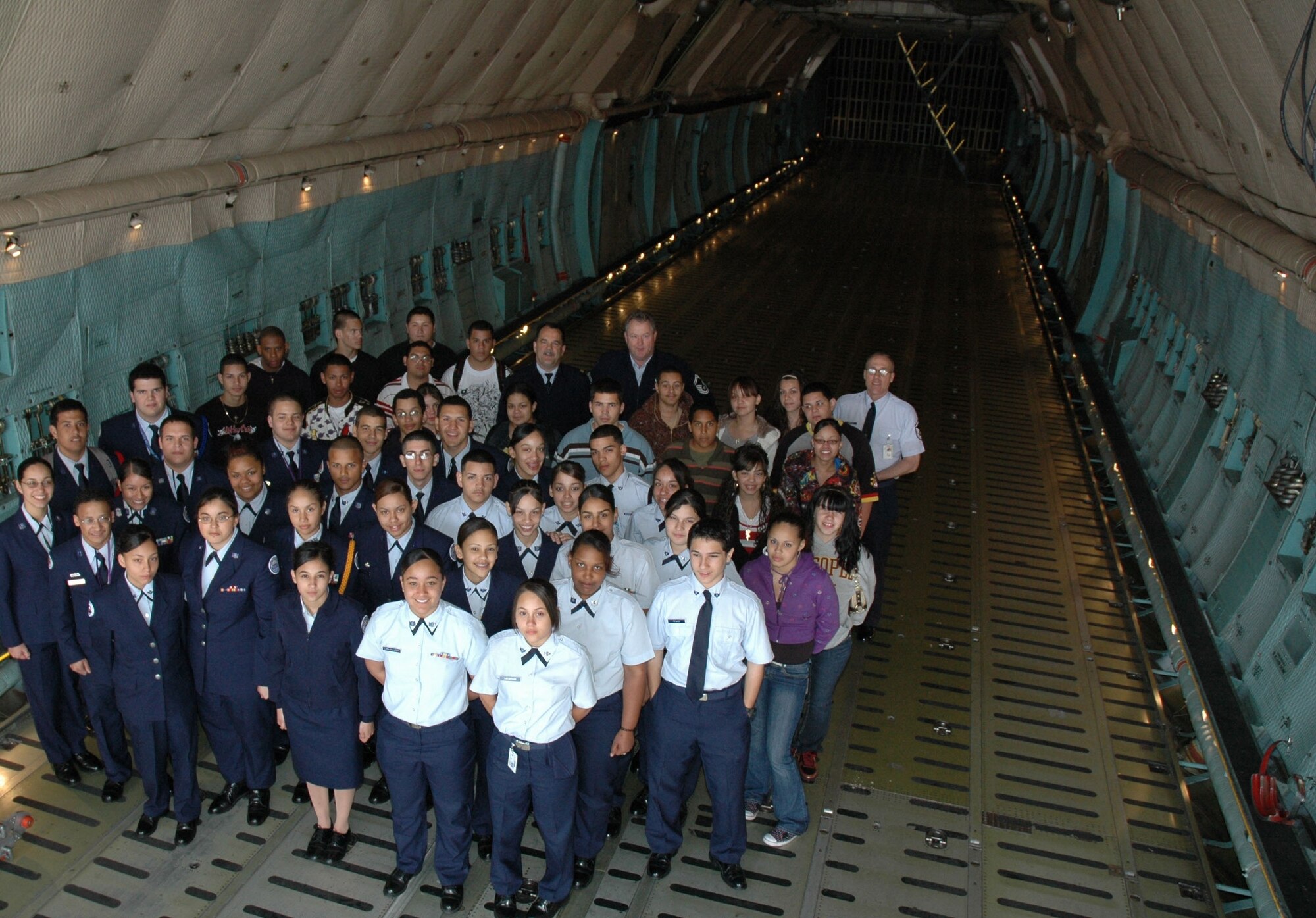 JROTC groups from the Springfield, Mass., area stand inside the cargo compartment of a Patriot Wing C-5. More than 70 local cadets from four schools spent the day at Westover in April 2008, as part of a Hispanic Youth Symposium. This event helped the 439th Airlift Wing Human Resources Development Council earn the Maj. Gen. Joseph A. McNeil Award for HRDC Leadership Excellence. (US Air Force photo/Tech. Sgt. Andrew Biscoe)