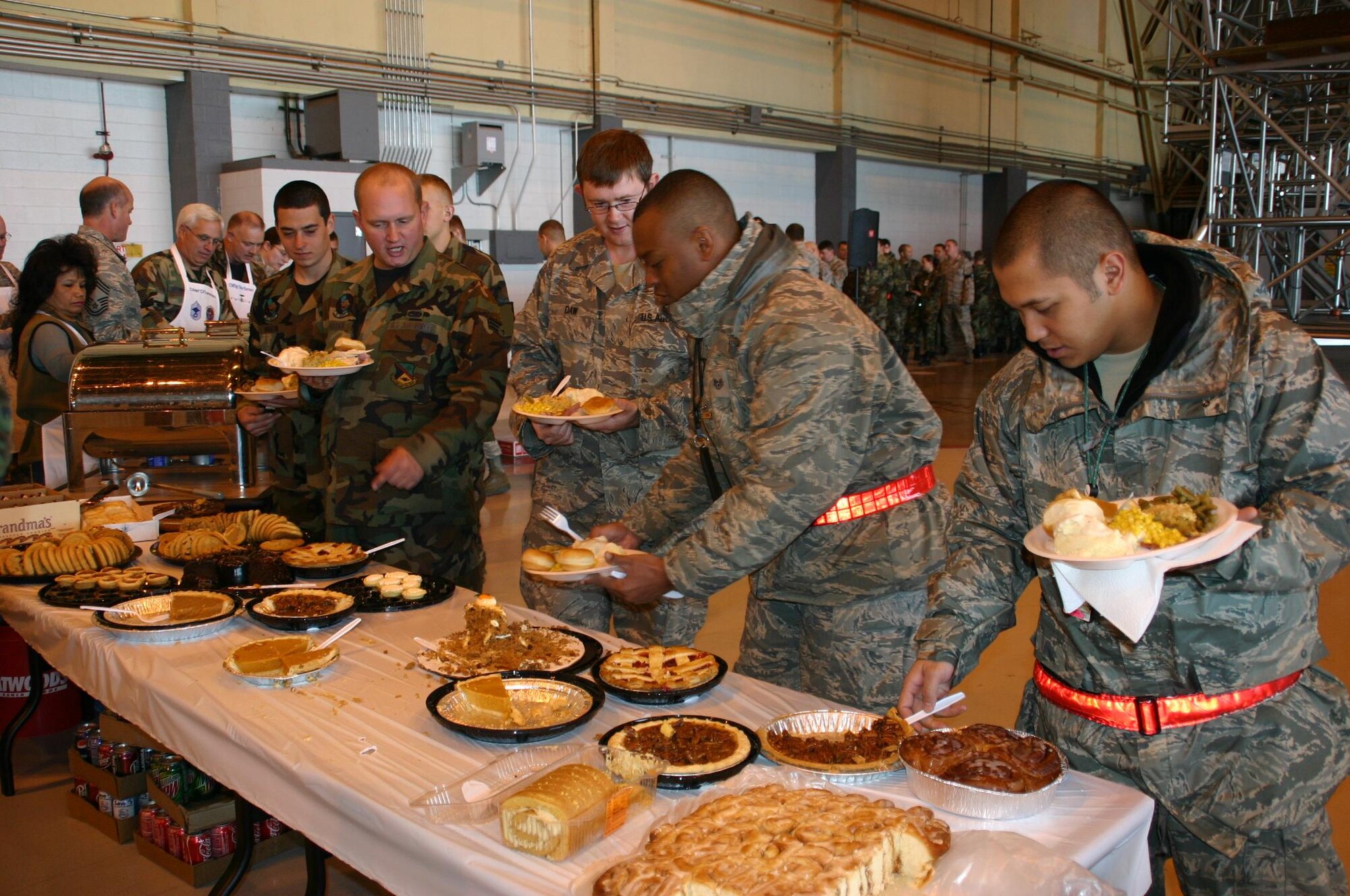 552nd Maintenance Group Airmen choose from the delicious spread of desserts at the annual MXG Turkey Feast November 20. Photo compliments of 1st Lt. Kinder Blacke.