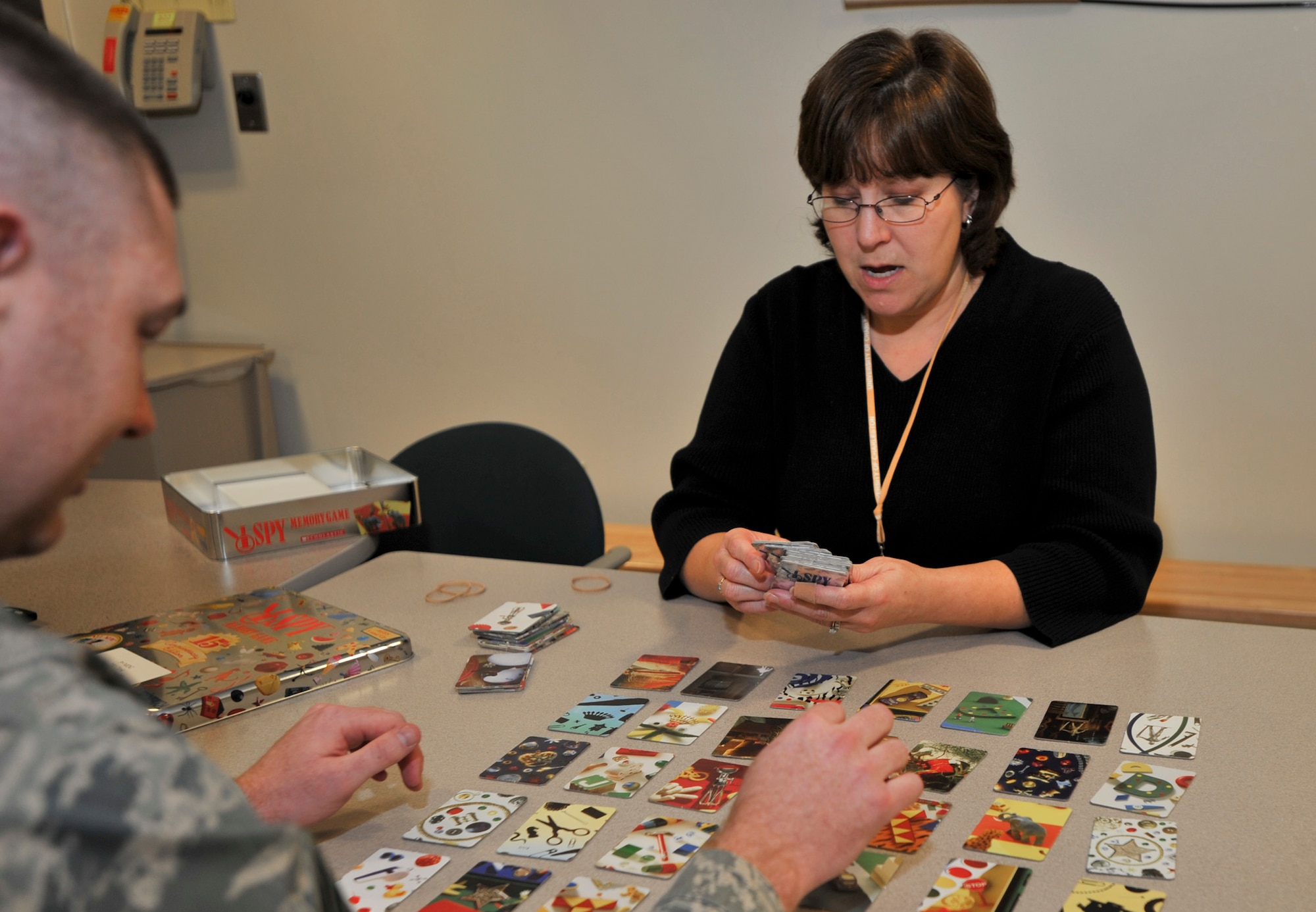 ELMENDORF AIR FORCE BASE, Alaska -- Nurse Case Manager Kim Krick plays a memory game in the Traumatic Brain Injury clinic Nov. 18. Ms. Krick help TBI patients set up there appointments and any other career transitioning processes that the patient may deal with. (U.S. Air Force photo/Senior Airman Tinese Treadwell)
