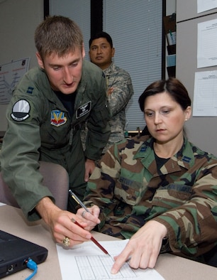 Members of Squadron Officer School class 09A participate in a leadership wargame-style simulation as part of their coursework Nov. 13. (Air Force photo by Melanie Rodgers)