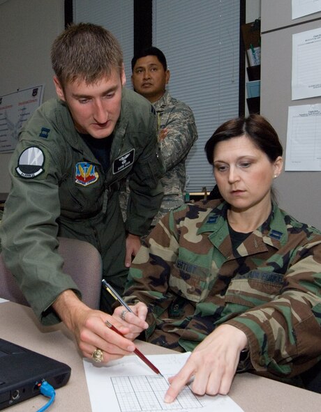 Members of Squadron Officer School class 09A participate in a leadership wargame-style simulation as part of their coursework Nov. 13. (Air Force photo by Melanie Rodgers)