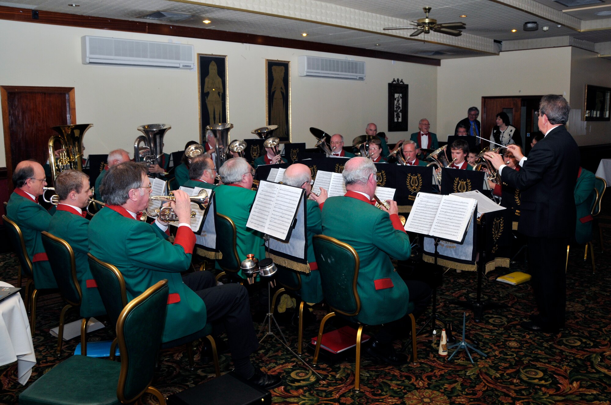 Breckland Brass Band spent the evening playing a variety of songs to entertain the guests Nov. 14 at RAF Lakenheath, England. The 48th Fighter Wing displayed the capabilities of the wing during the 60th anniversary of RAF Lakenheath. (U.S. Air Force photo by Airman 1st Class Perry Aston)