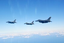 An 80th Fighter Squadron F-16 flies in formation with Republic of Korea Air Forces' KF-16s from the 159th Fighter Squadron while participating in the Buddy Wing program at Jungwon Air Base, Republic of Korea, Nov. 20, 2008.  The Buddy Wing program is designed to further increase U.S. Air Force and ROKAF interoperability in an aerospace conflict by having pilots from each air force fly with and against each other. (U.S. Air Force Photo by Staff Sgt. Jason Colbert)