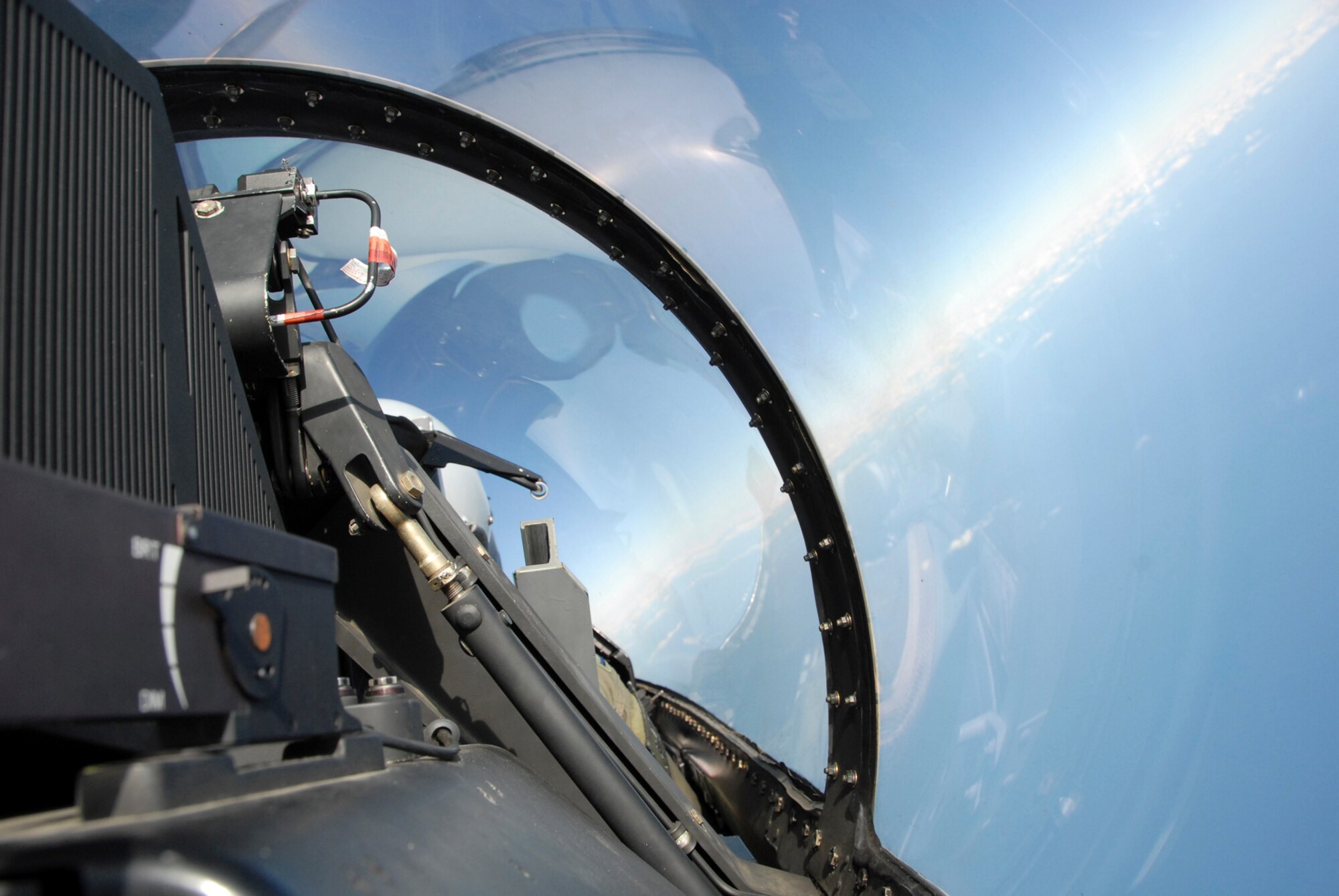 First Lt. Matt Crabb, 80th Fighter Squadront, banks right while persuing an enemy aircraft over Jungwon Air Base, Republic of Korea, Nov. 20, 2008. The Buddy Wing program is designed to further increase U.S. Air Force and Republic of Korea Air Forces' interoperability in an aerospace conflict by having pilots from each air force fly with and against each other. (U.S. Air Force Photo by Staff Sgt. Jason Colbert)