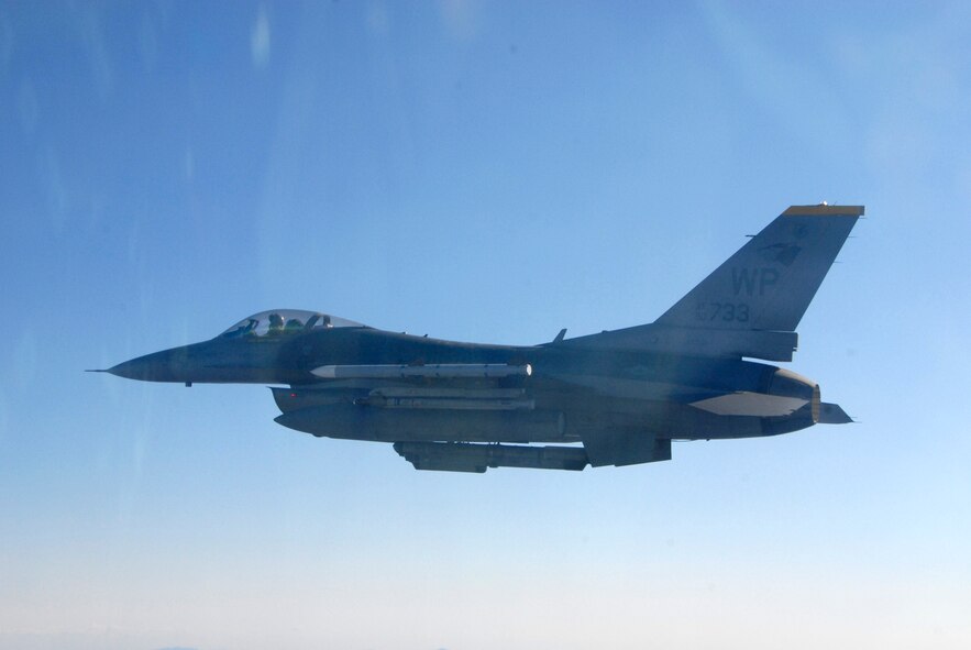 U.S. Air Force Capt. Matthew Eldredge, 80th Fighter Squadron pilot, flies an F-16 Fighting Falcon over the skies of Jungwon Air Base, Republic of Korea, while participating in the Buddy Wing program, Nov. 19, 2008. The Buddy Wing program is designed to further increase U.S. Air Force and Republic of Korea Air Forces' interoperability in an aerospace conflict by having pilots from each air force fly with and against each other. (U.S. Air Force Photo by SSgt Jason Colbert)