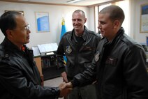 First Lt. Matt Crabb and Capt. Matthew Eldredge , 80th Fighter Squadron, meet with Republic of Korea Air Forces' Brig. Gen. Jin, 19th Tactical Fighter Wing commander at Jungwon Air Base, Republic of Korea,Nov. 18, 2008. The Buddy Wing program is designed to further increase U.S. Air Force and ROKAF interoperability in an aerospace conflict by having pilots from each air force fly with and against each other. (U.S. Air Force Photo by Staff Sgt. Jason Colbert)