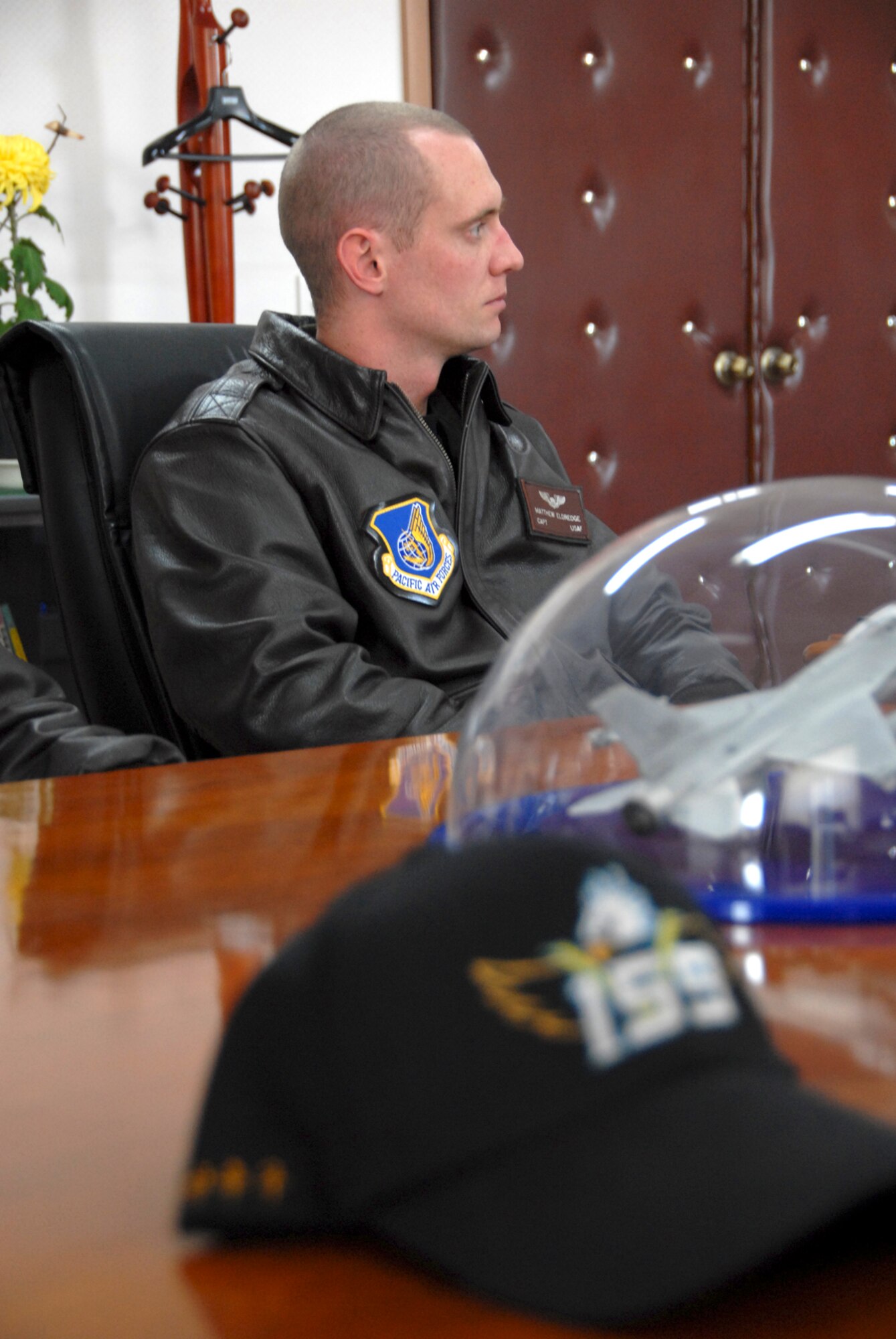 Captain Matthew Eldredge, 80th Fighter Squadron pilot, speaks to the 19th Tactical Fighter Wing commander while participating in the Buddy Wing program at Jungwon Air Base, Republic of Korea, Nov. 18, 2008. The Buddy Wing program is designed to further increase U.S. Air Force and ROKAF interoperability in an aerospace conflict by having pilots from each air force fly with and against each other. (U.S. Air Force Photo by Staff Sgt. Jason Colbert)