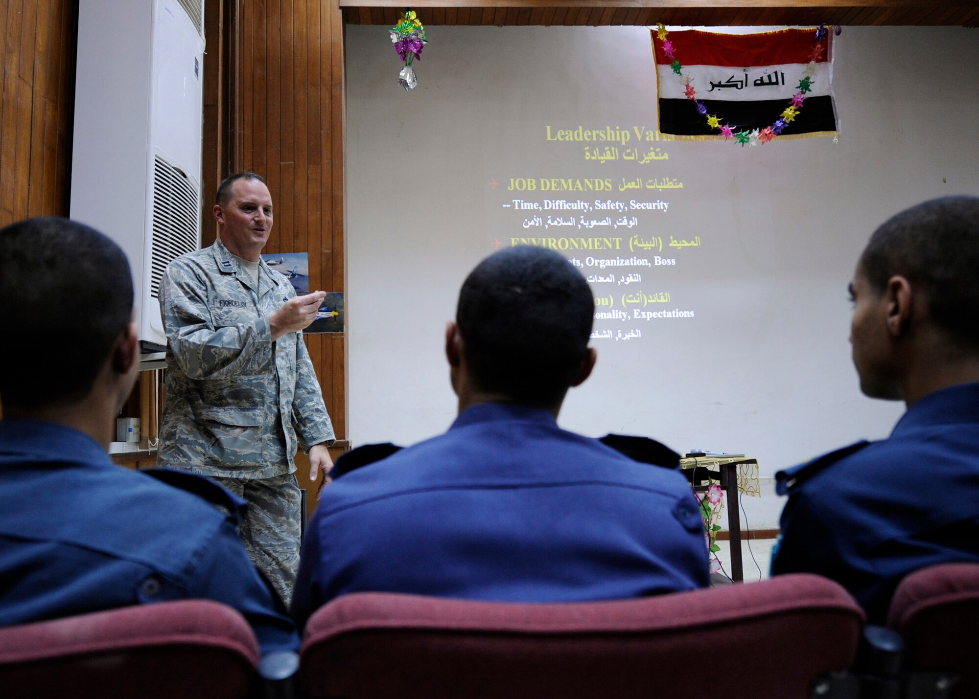 RUSTAMIYAH, Iraq -- Captain Tom Fiordelisi, an air advisor with the 321st Air Expeditionary Training Group, instructs situational leadership to Iraqi air force cadets at Forward Operating Base Rustamiyah, Iraq on Nov. 10. Fiordelisi, a Seymour, Conn. native, is the Air Force Reserve Officer Training Corps, Detachment 630 commadant of cadets at Kent State University, Ohio.  (U.S. Air Force photo/Staff Sgt. Paul Villanueva II)