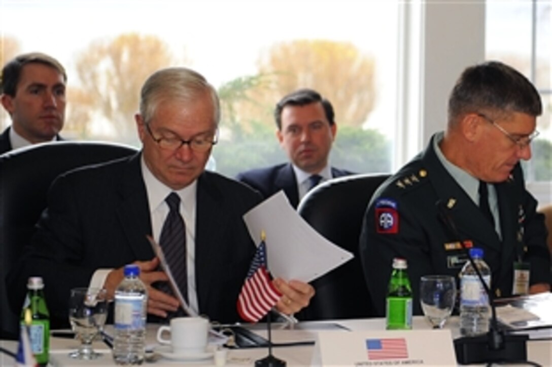 U.S. Defense Secretary Robert M. Gates looks over some paperwork in Cornwallis Park, Nova Scotia, Nov. 21, 2008. Gates is taking part in discussions of International Security Assistance Forces, Regional Command South, which is comprised of forces from Canada, Australia, Denmark, Estonia, Netherlands, Romania, United Kingdom, and the United States.